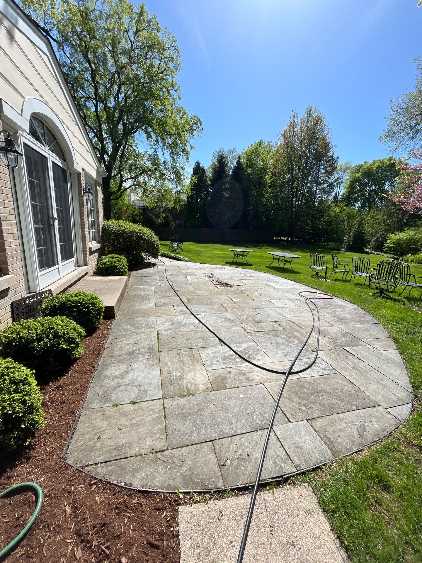 natural stone using Algaecide, soft wash soap by Northern Power Washing LLC.