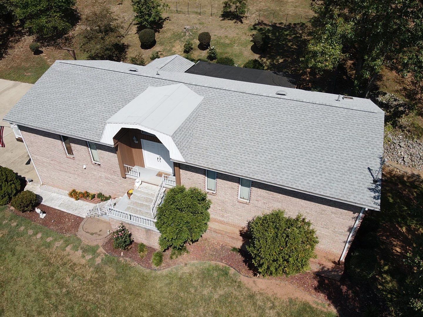 Residential Roofing Installation using GAF Timberline HDZ Fox Hollow Grey by Rainstoppers Roofing