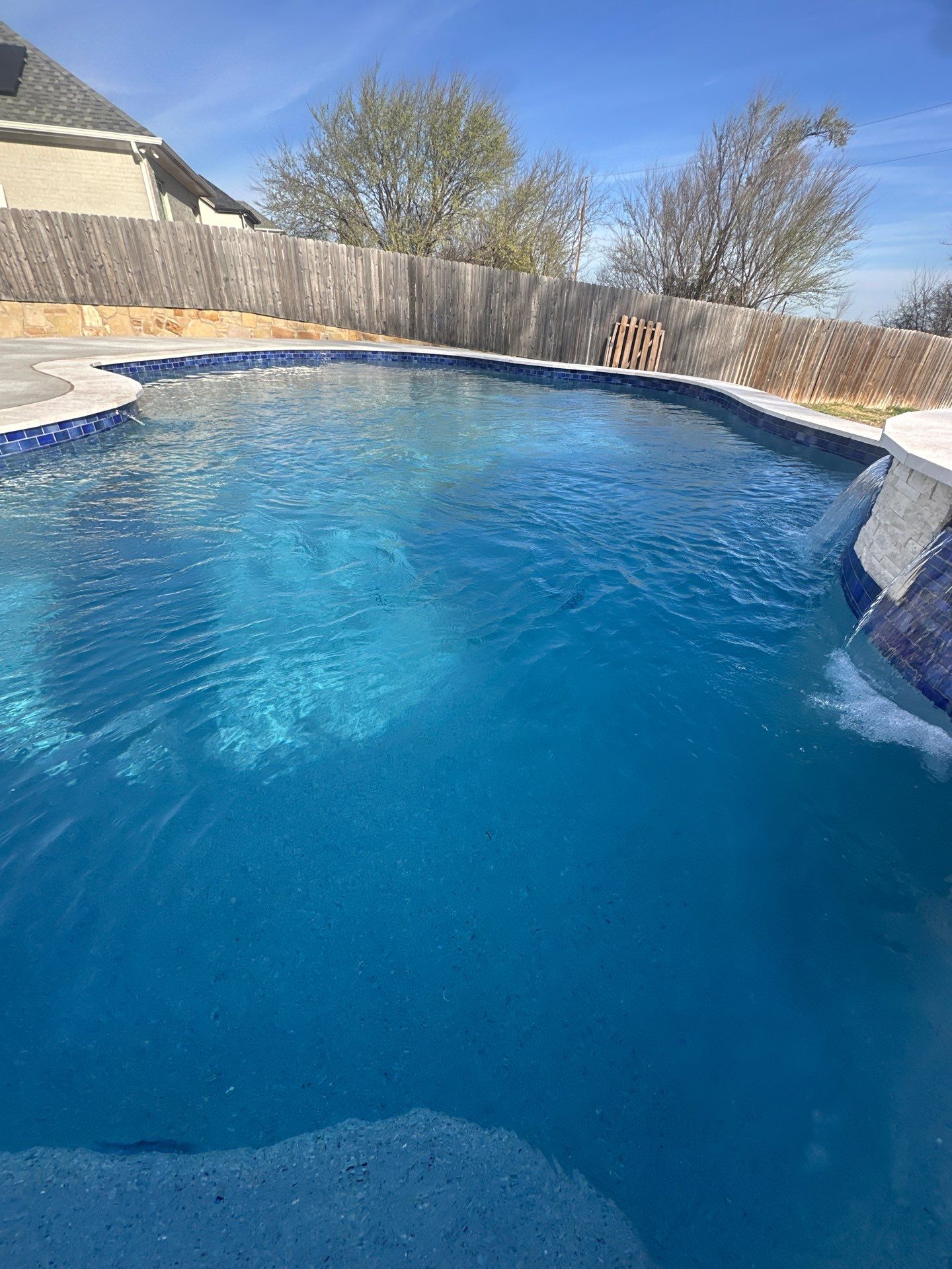 Freeform Pool with Raised Spa and Water Feature by Pinnacle Pools and Spas - DFW