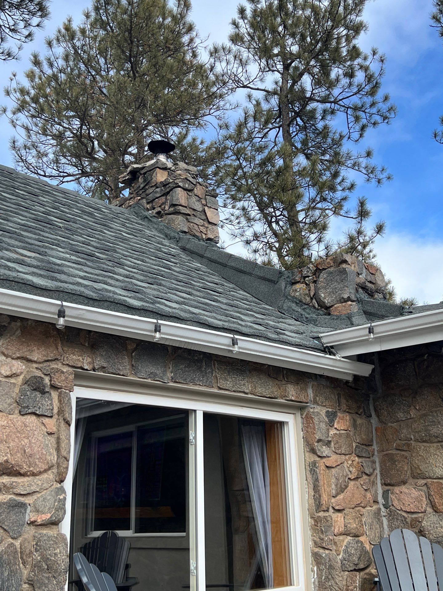 Residential Roofing Installation using Stone Coated Steel by Blue Peaks Roofing LLC 