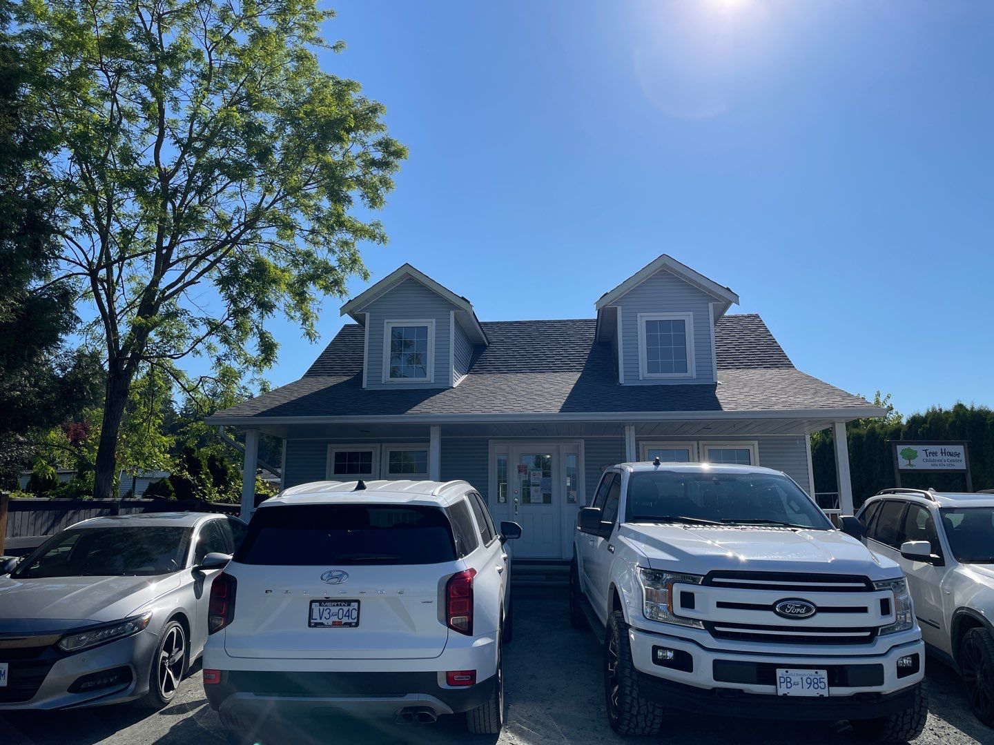 Residential Roofing Installation using Estate Gray Shingles by Top Notch Roofing Inc