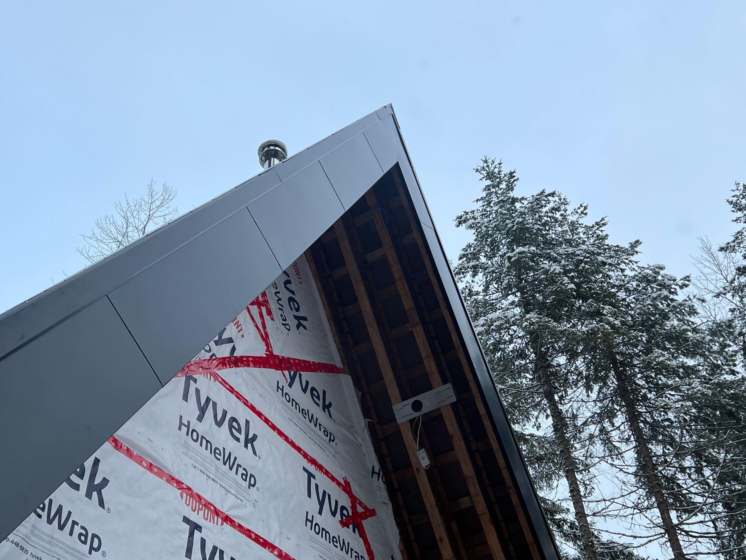 Residential Roofing Installation using 12" Prolok metal  by Top Notch Roofing Inc