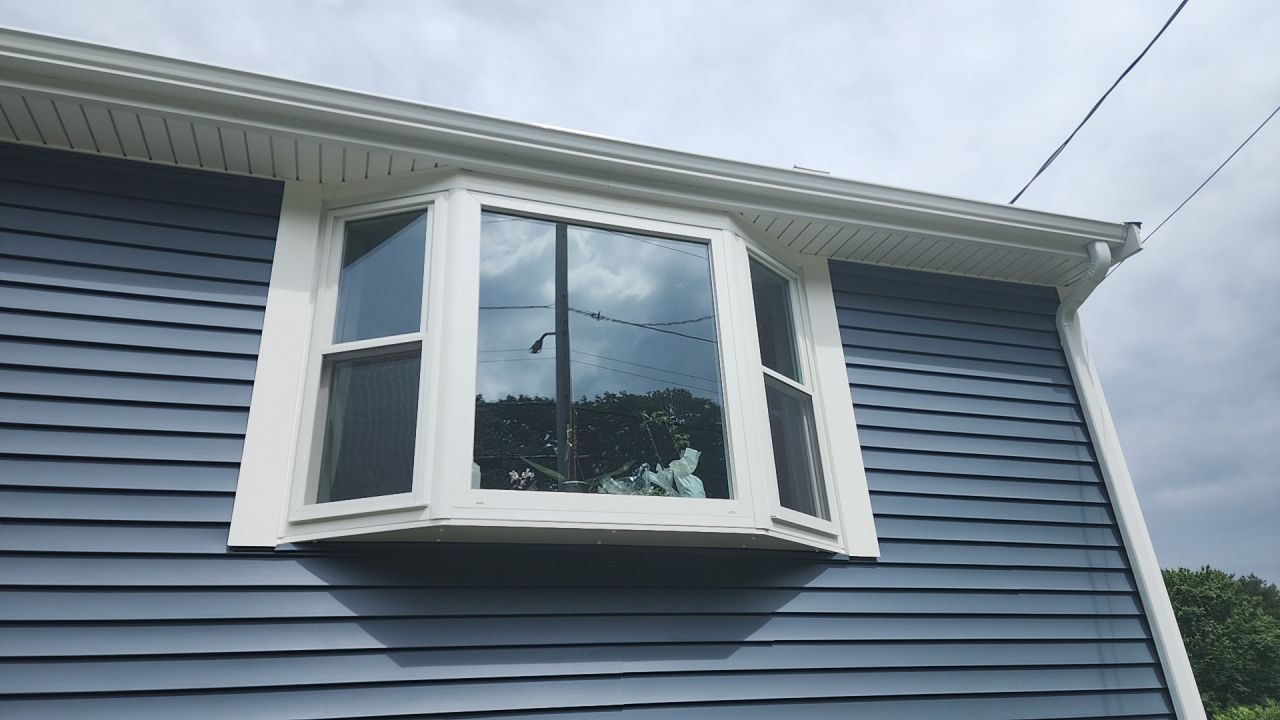 Siding and windows replaced by UBrothers Construction