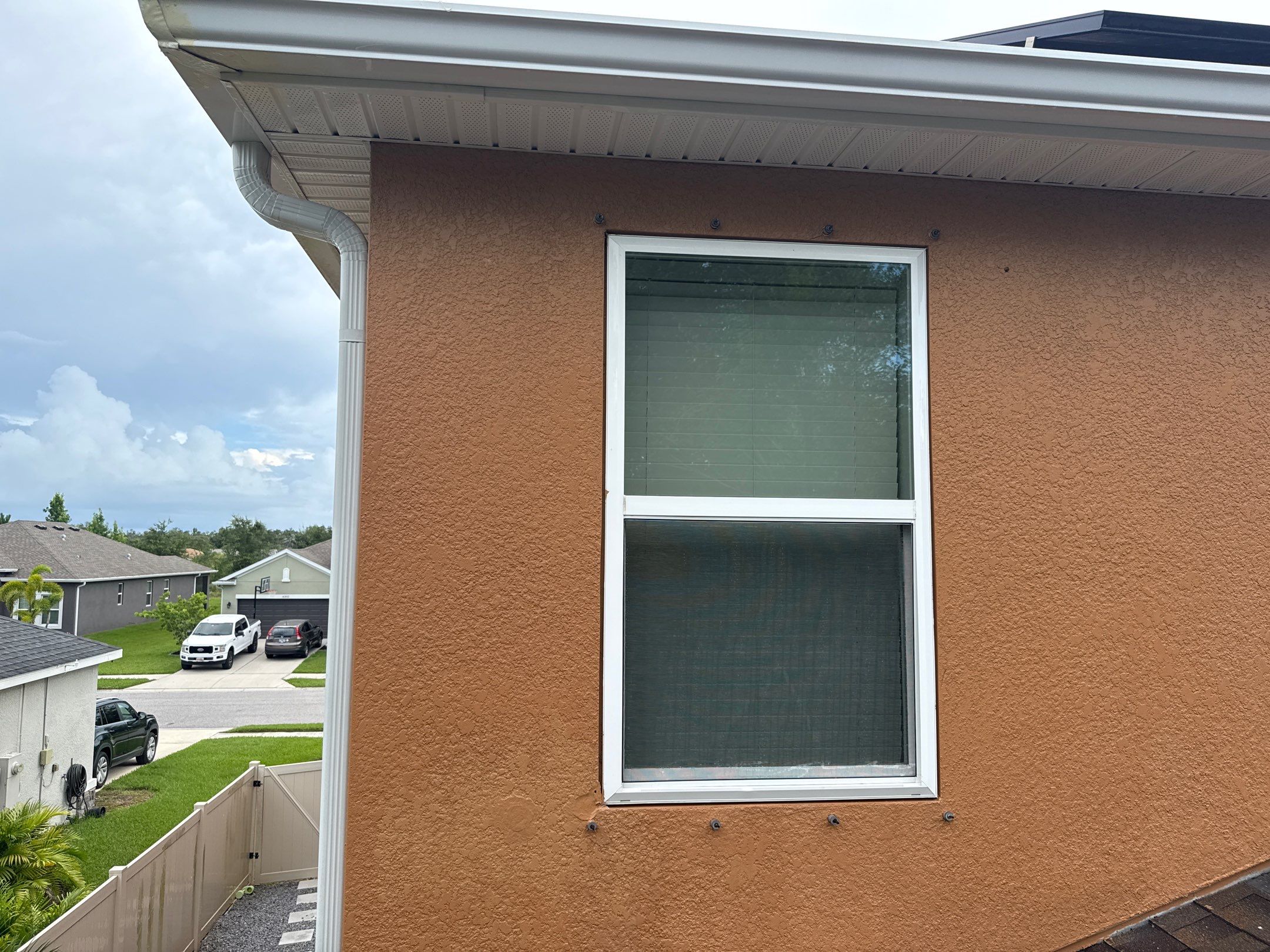 Full Exterior Cleaning – Two-Story House, Gutters, and Fence in Old Mill Preserve, Palmetto, FL by Sunshine AquaWash