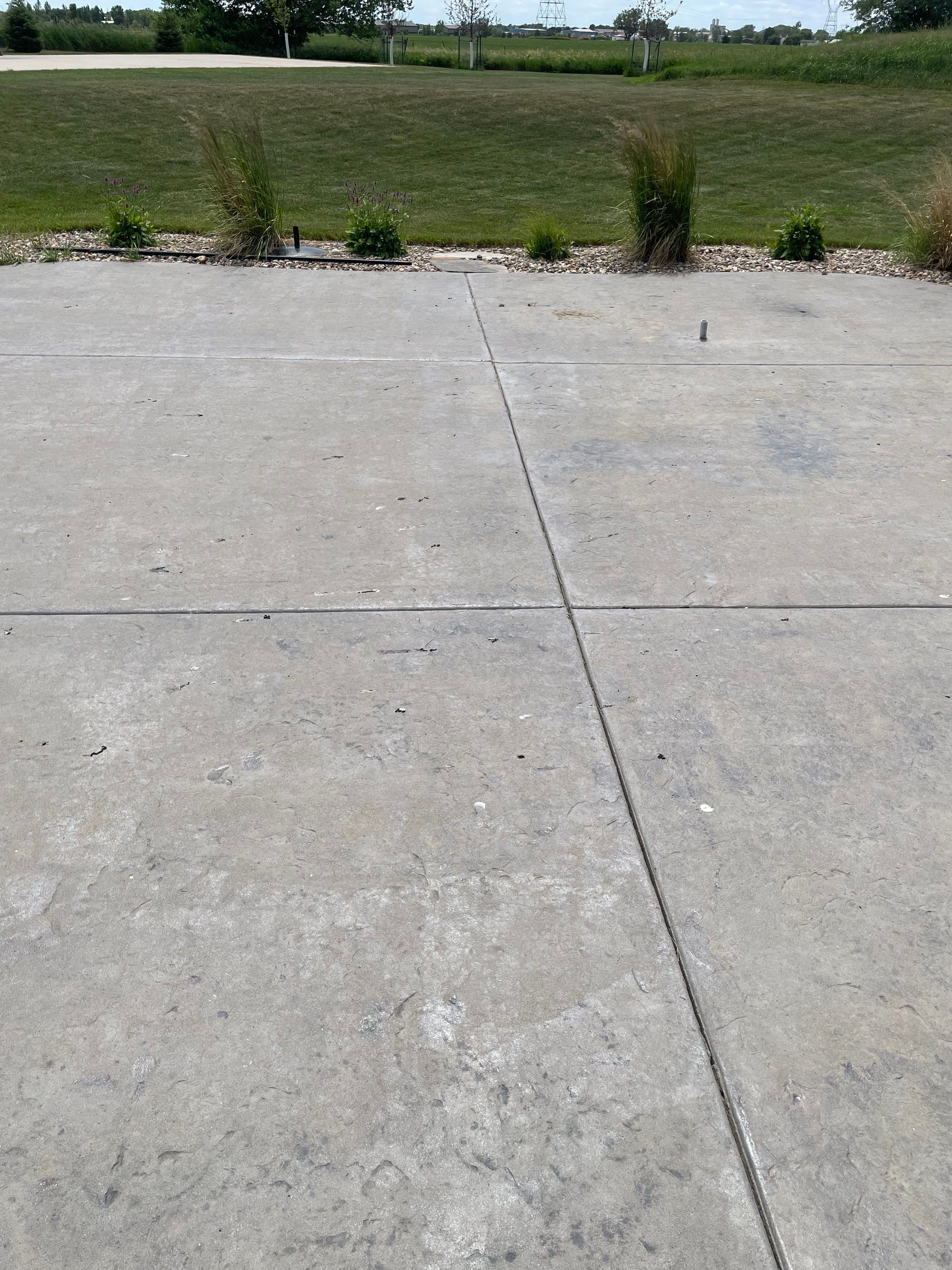 Concrete Patio Restoration and Installation in Sioux Falls by Select Painting, Coatings & Garage Cabinets