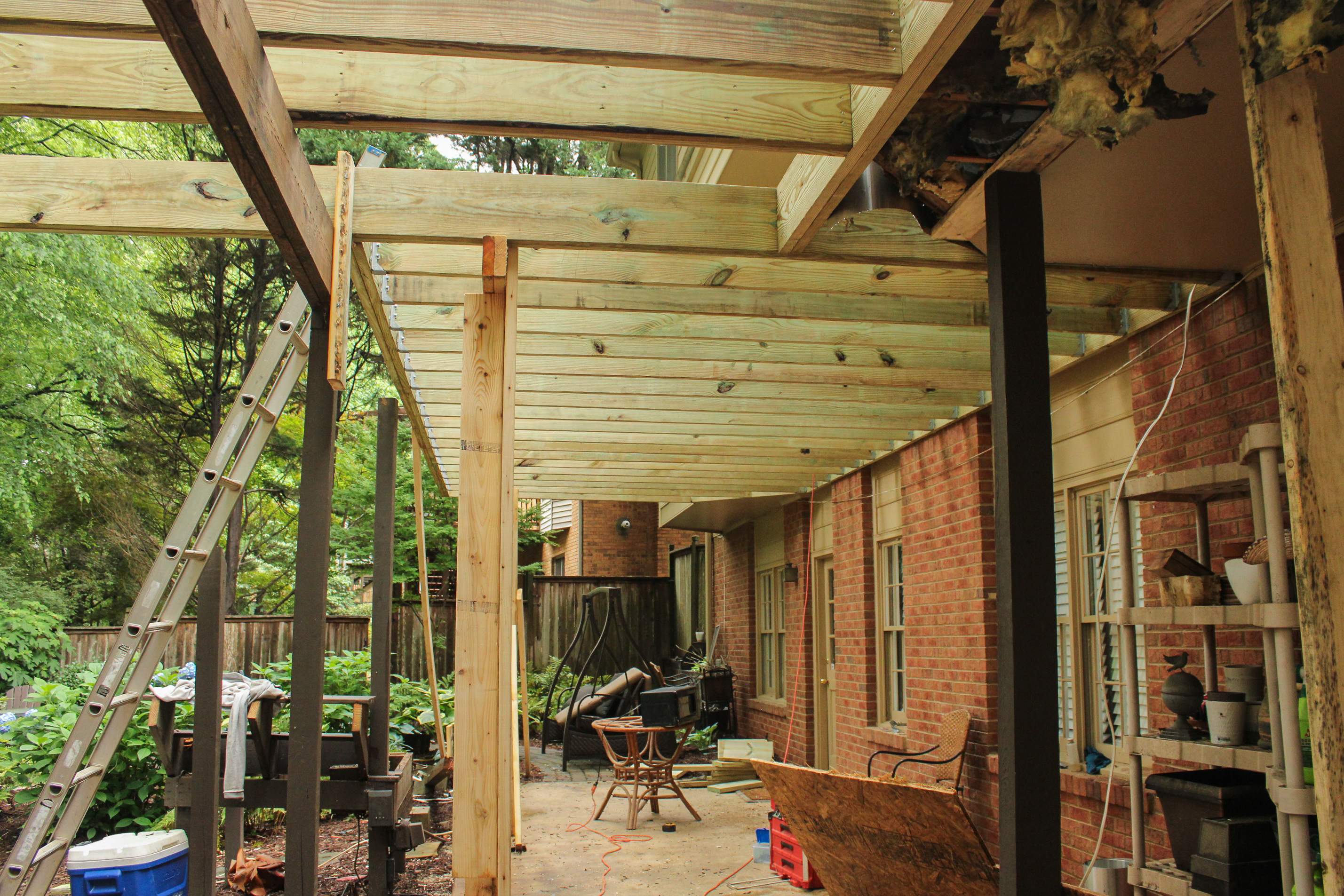 Deckorators Voyage Deck and Shed Style Covered Porch Build with Drink Rail by Nelson Exteriors 