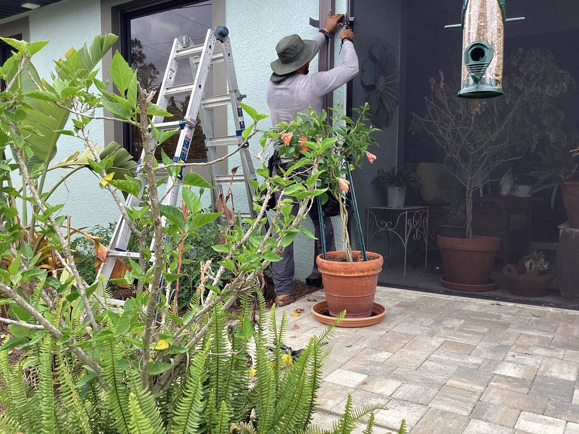 Musket Brown and New Downspouts in Lehigh Acres, FL  by Gutter Professors