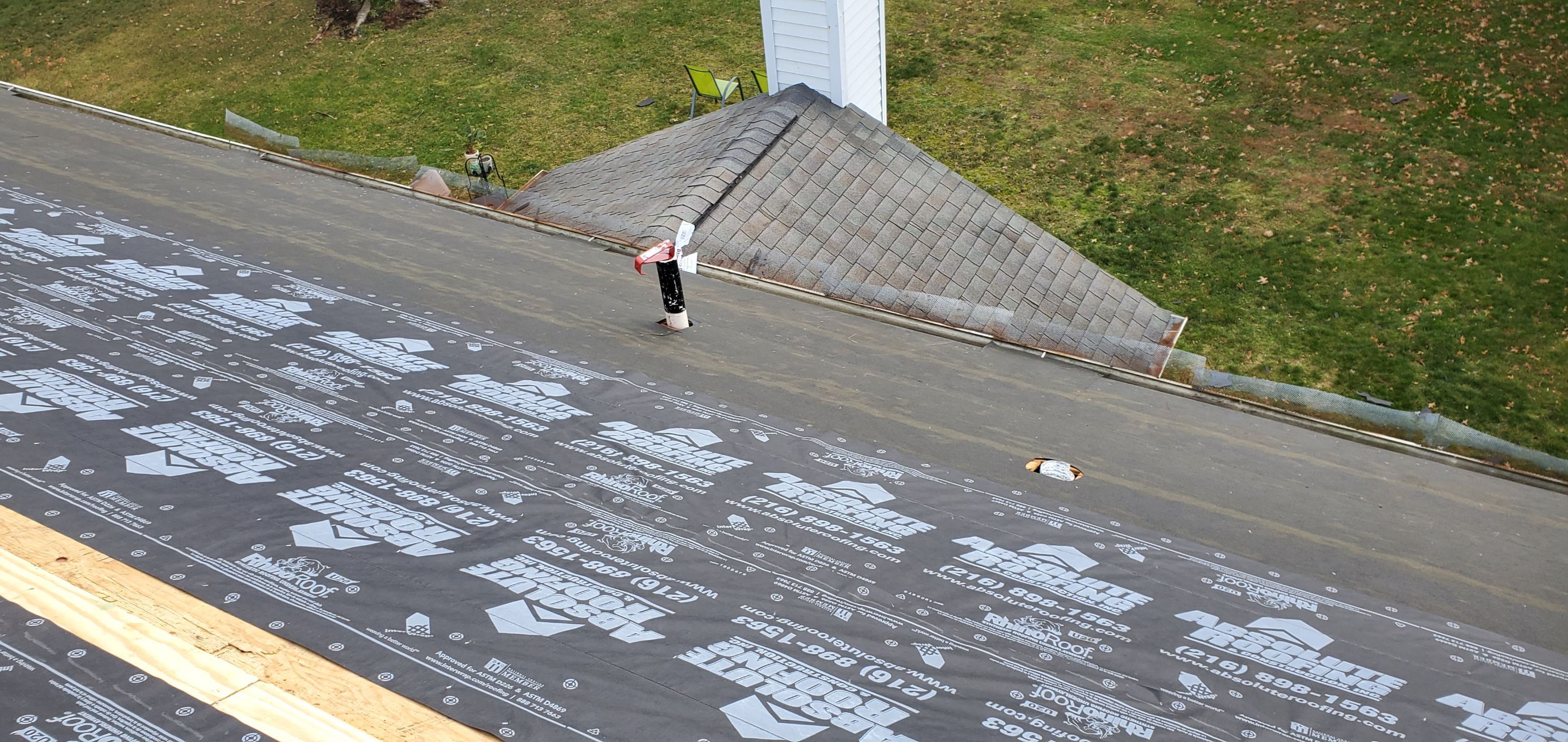 James Hardie Siding  using James Hardie Board and Batten, White by Absolute Roofing and Construction