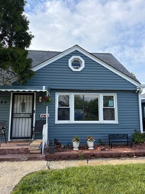 Roof and siding replacement by wind damage 