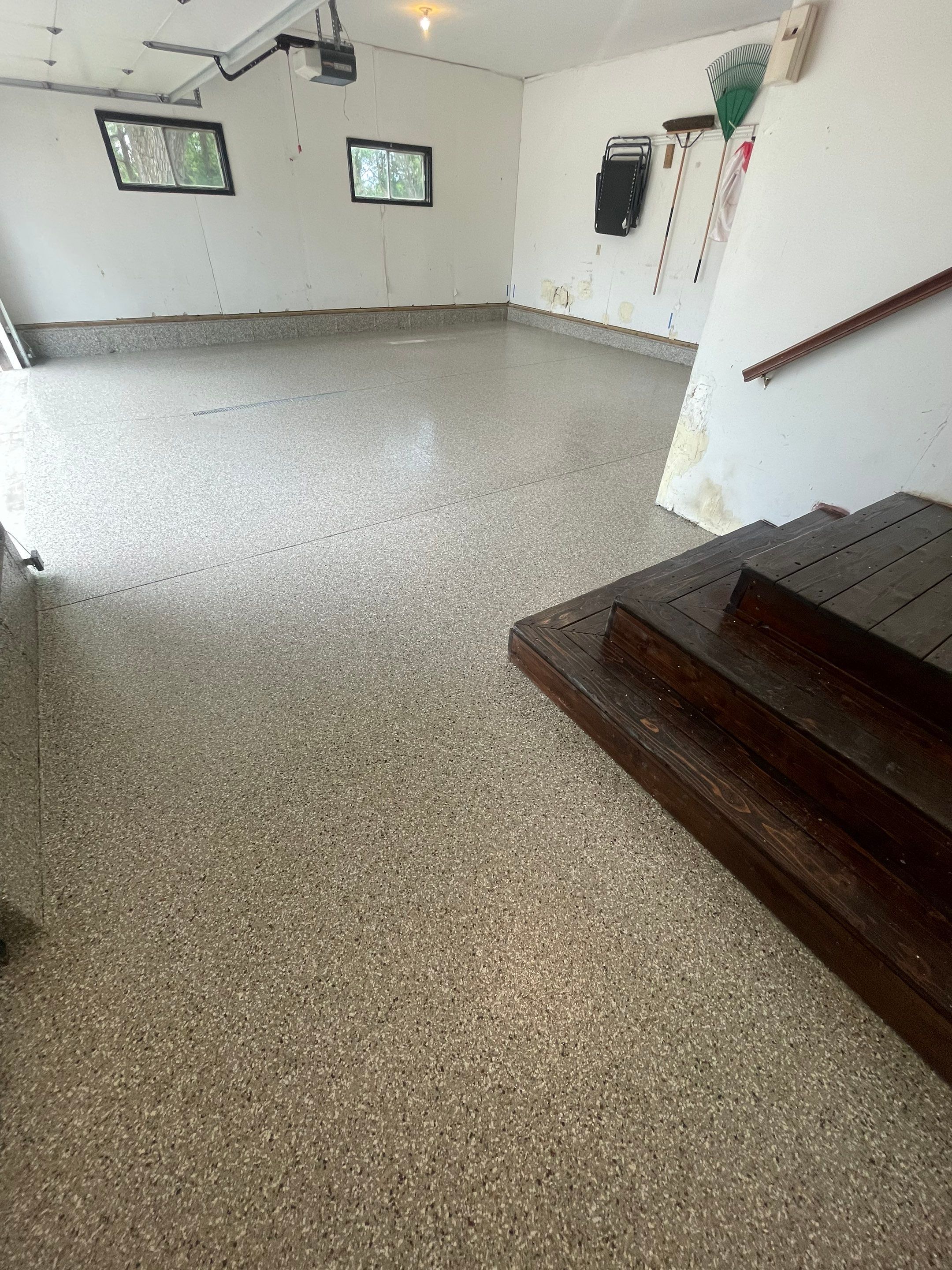 Hartford Residential Garage Floor Transformation With Decorative Chip Coating by Select Painting, Coatings & Garage Cabinets