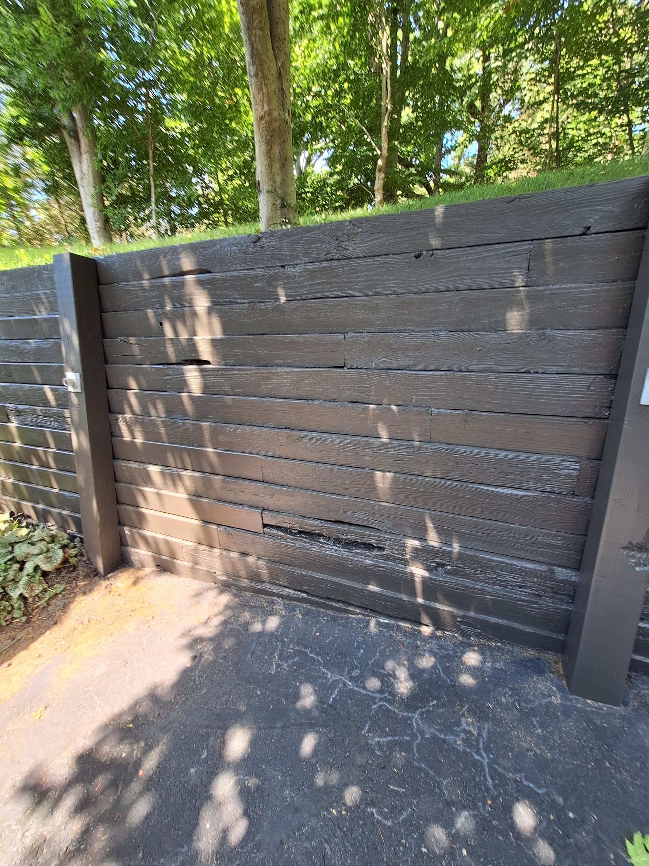 Exterior Retaining Wall Painting | Grand Haven, Michigan by Gordon Painting