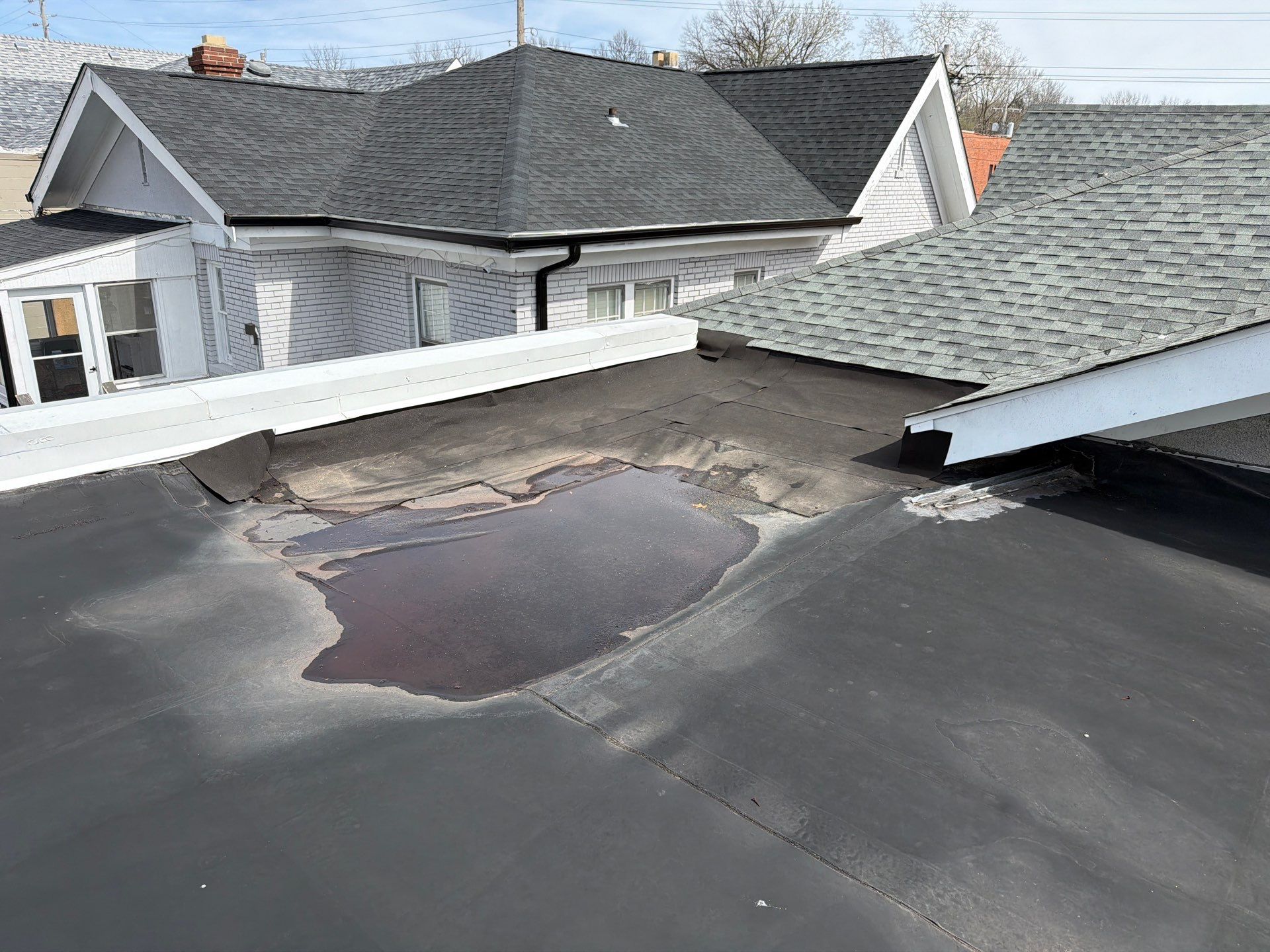 Flat Roof Replacement with New TPO Membrane in St. Louis by Acute Roofing And Exteriors 