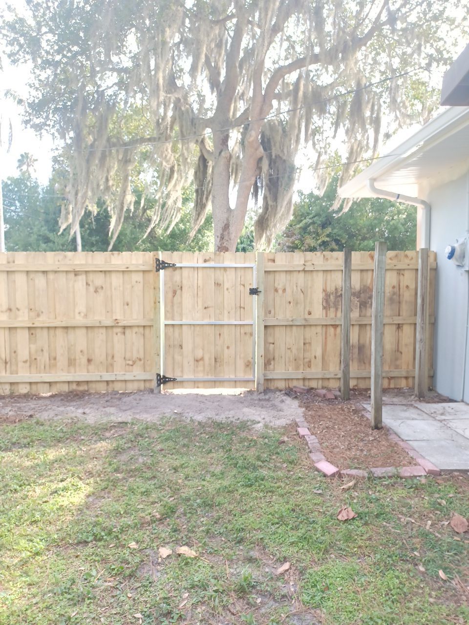 Sarasota, FL 6ft. Tall Treated Board on Board Wood Fence by Asap fence and gates, LLC