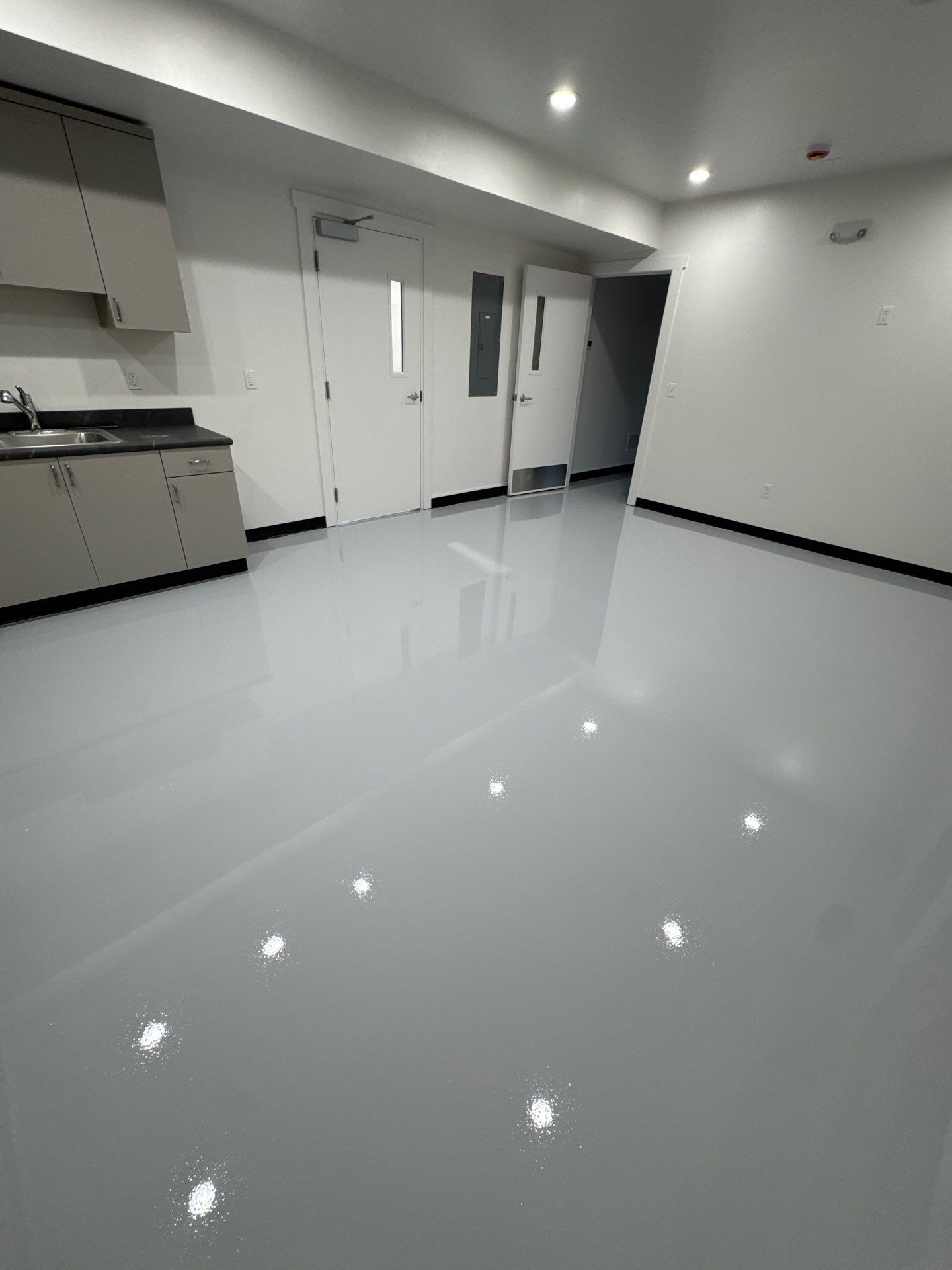Colfax Commercial Shop Transformation With Vapor Mitigating Floor Coatings by Croc Coatings, LLC