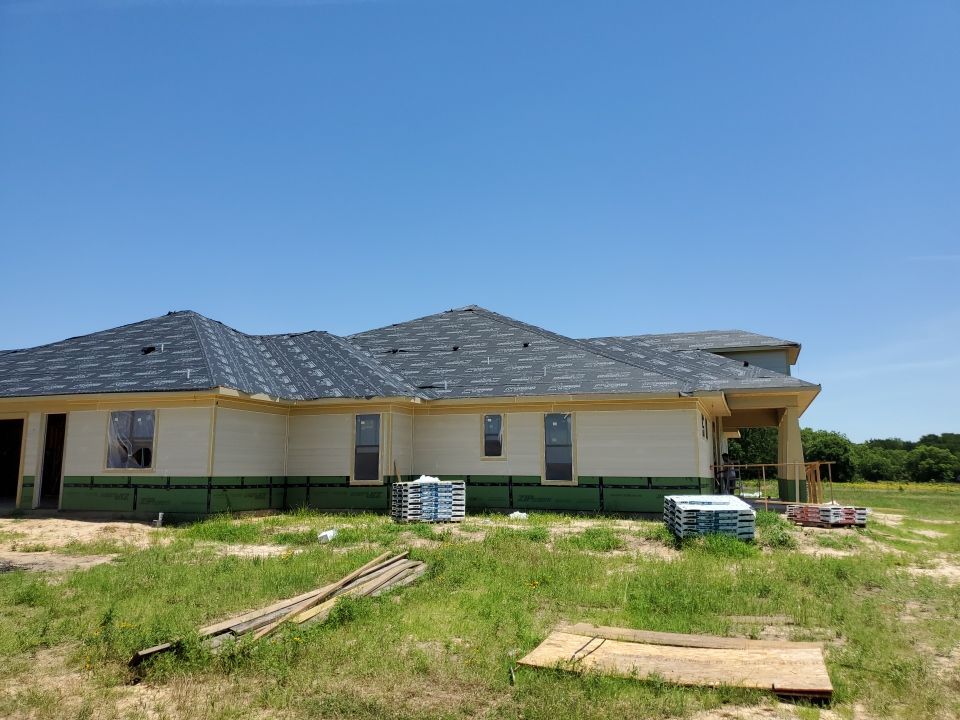 Residential Roofing Installation  by Harvey Roofing & Construction