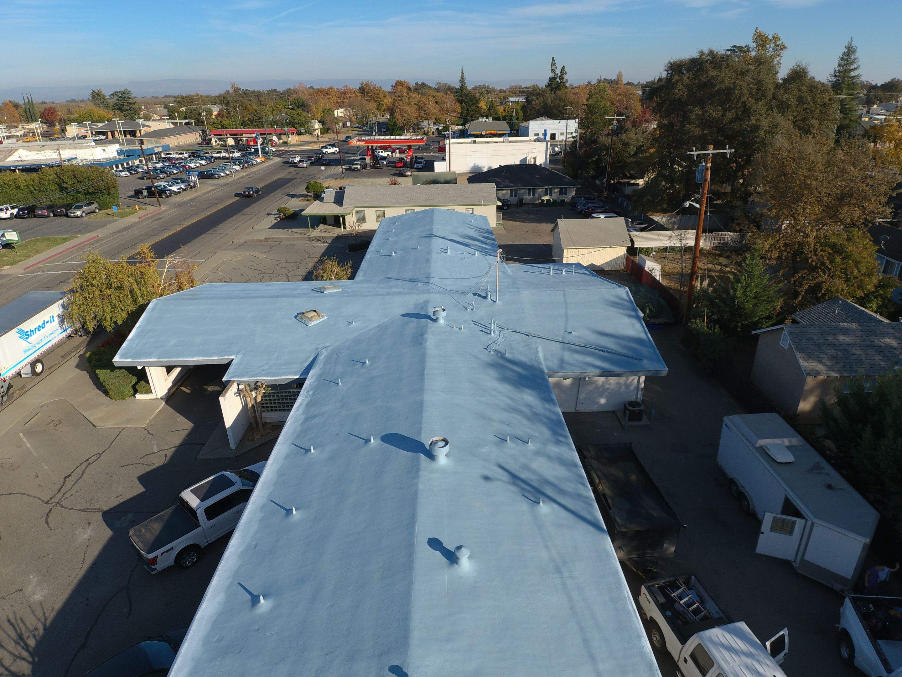 Spray foam and coatings using Conklin Benchmark/PUMA XL coatings and spray foam by Straight Edge Roofing Inc