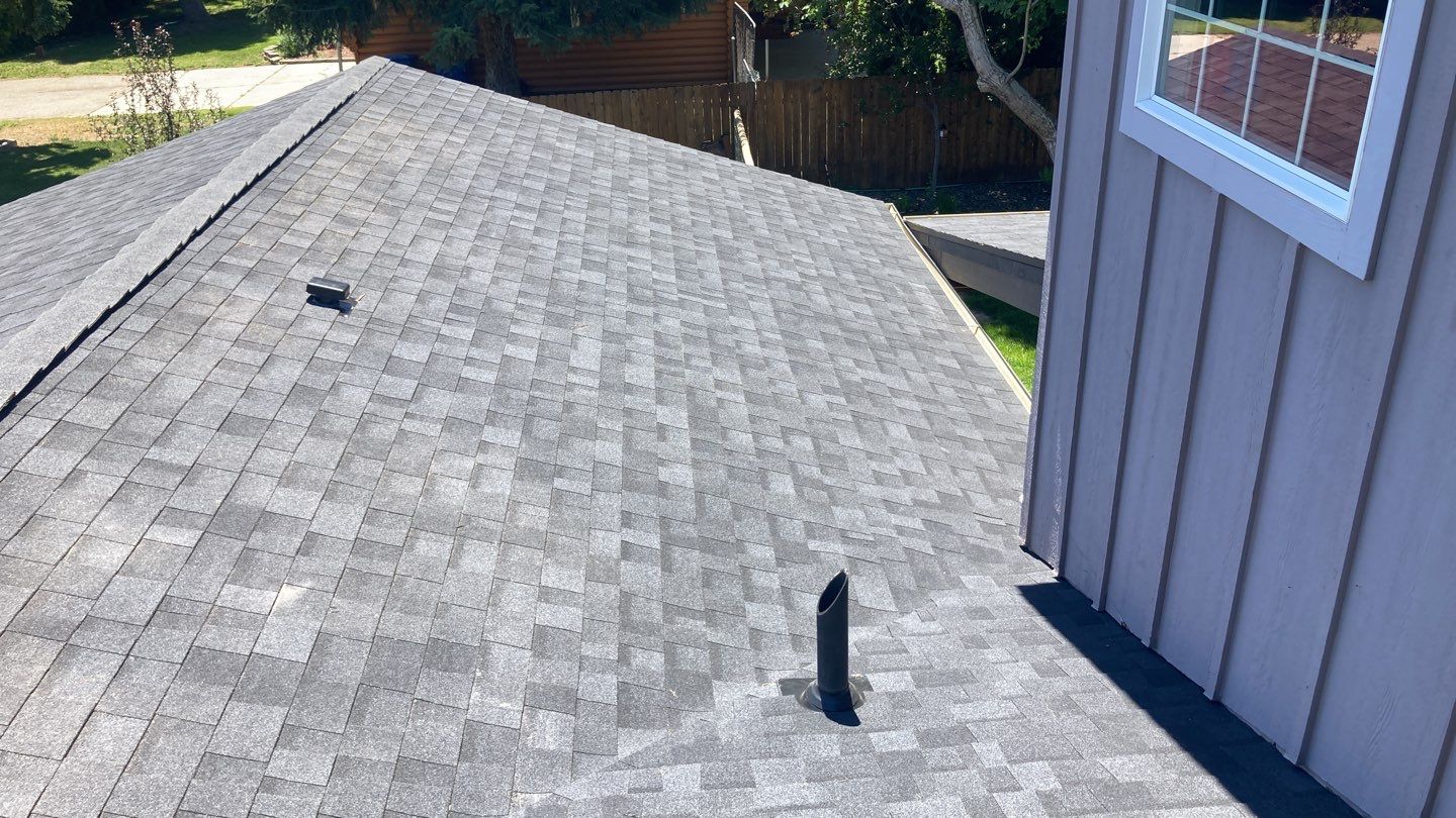 Breaking News!  Happy Homeowner gets a fantastic new roof by ID Roofing LLC