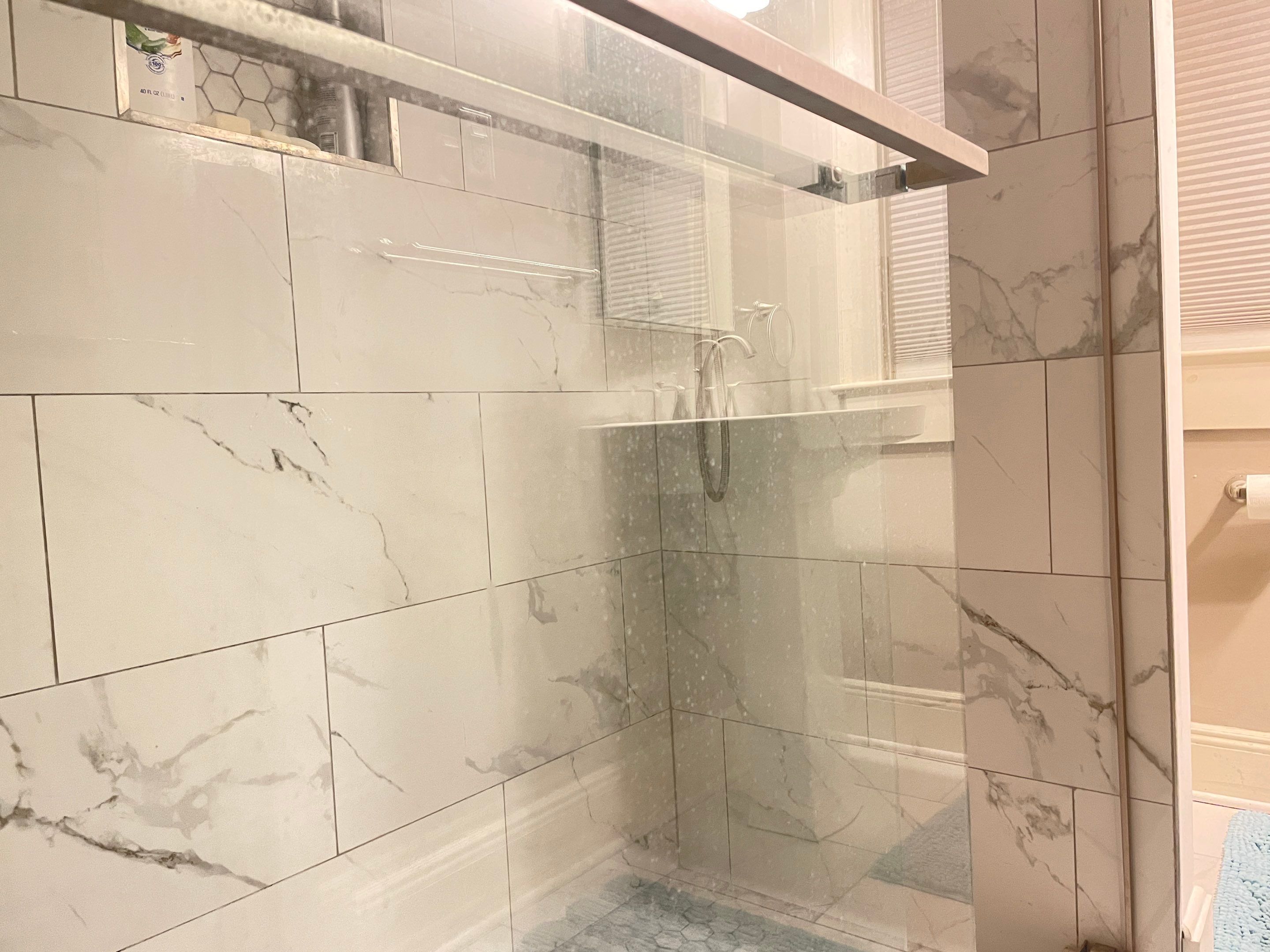 Bathroom Remodel using Tile by Home Concepts Construction