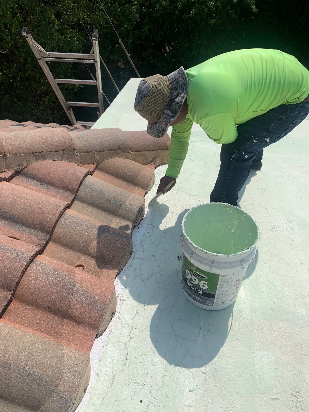 100% Silicone Roof Coating Repair using Tropical #924 Silicone Roof Coating by Morton Roofing, Inc.