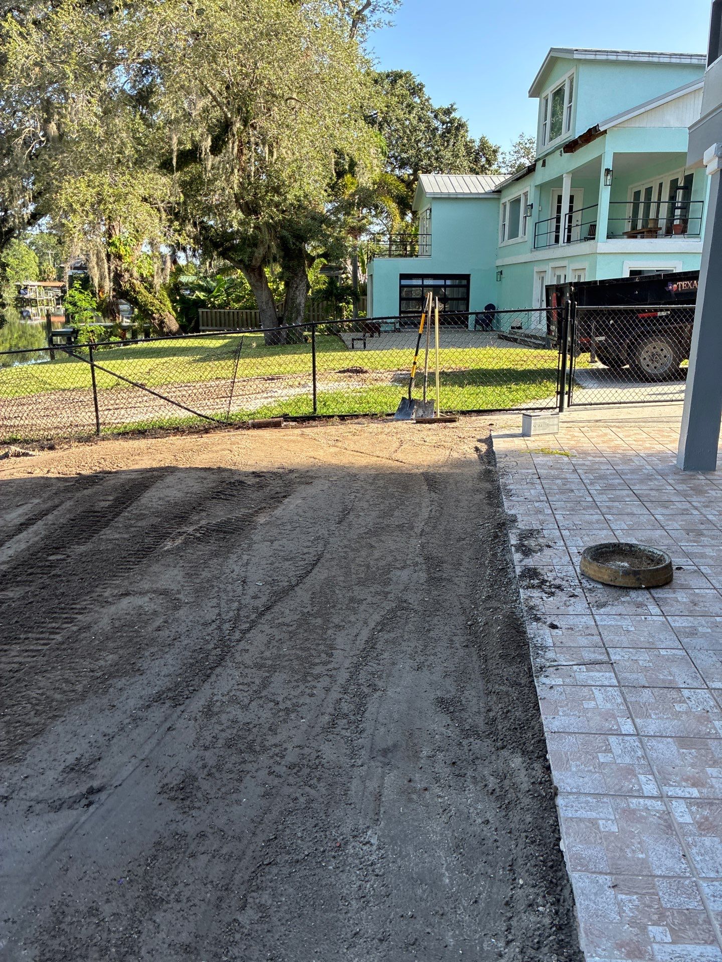Grading back yard oasis by Level One Grading 