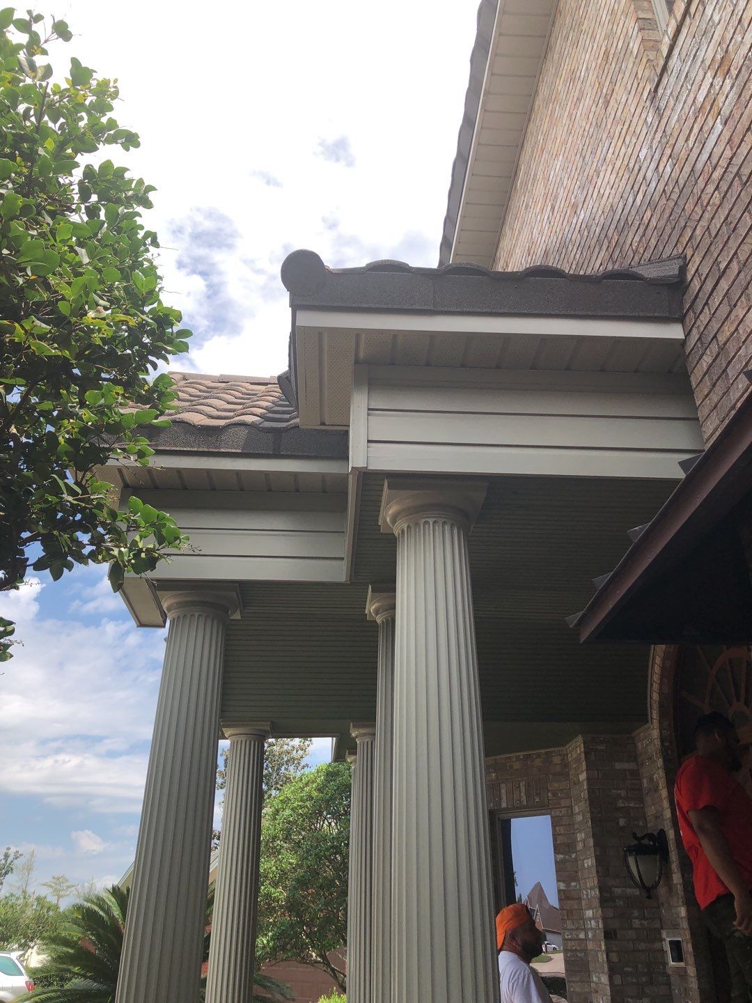 Seamless Gutter Installation with Wicker Color K-Style Gutters and LeafBlaster Pro Mesh Gutter Guards by Gutter Professors