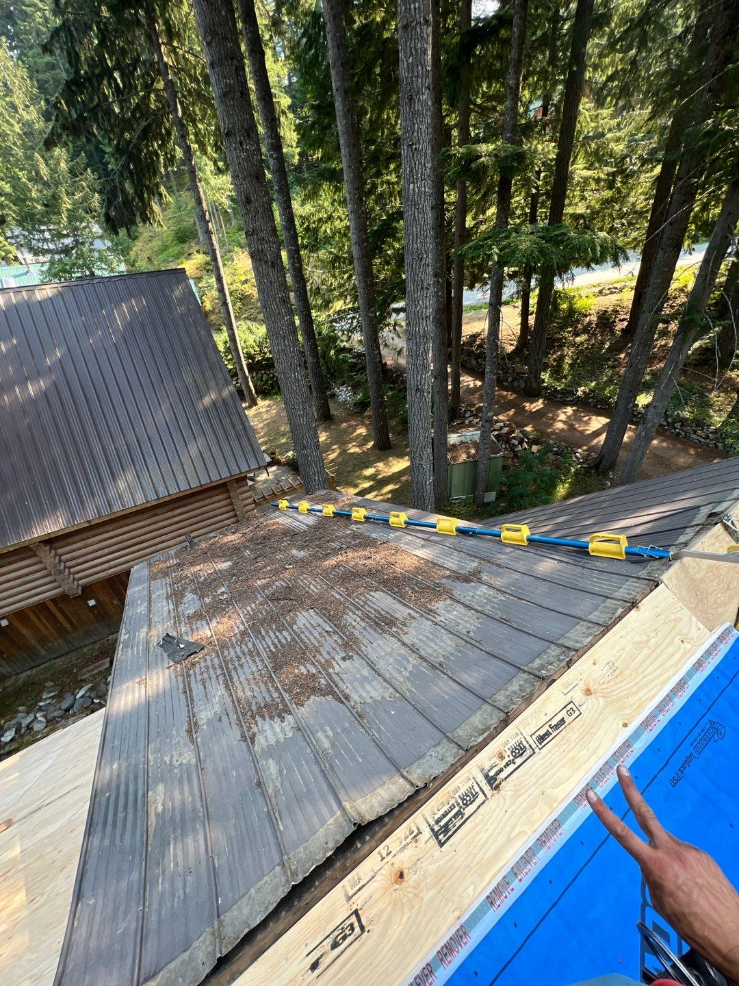 Residential ReRoofing Installation using 12" Prolok metal  by Top Notch Roofing Inc