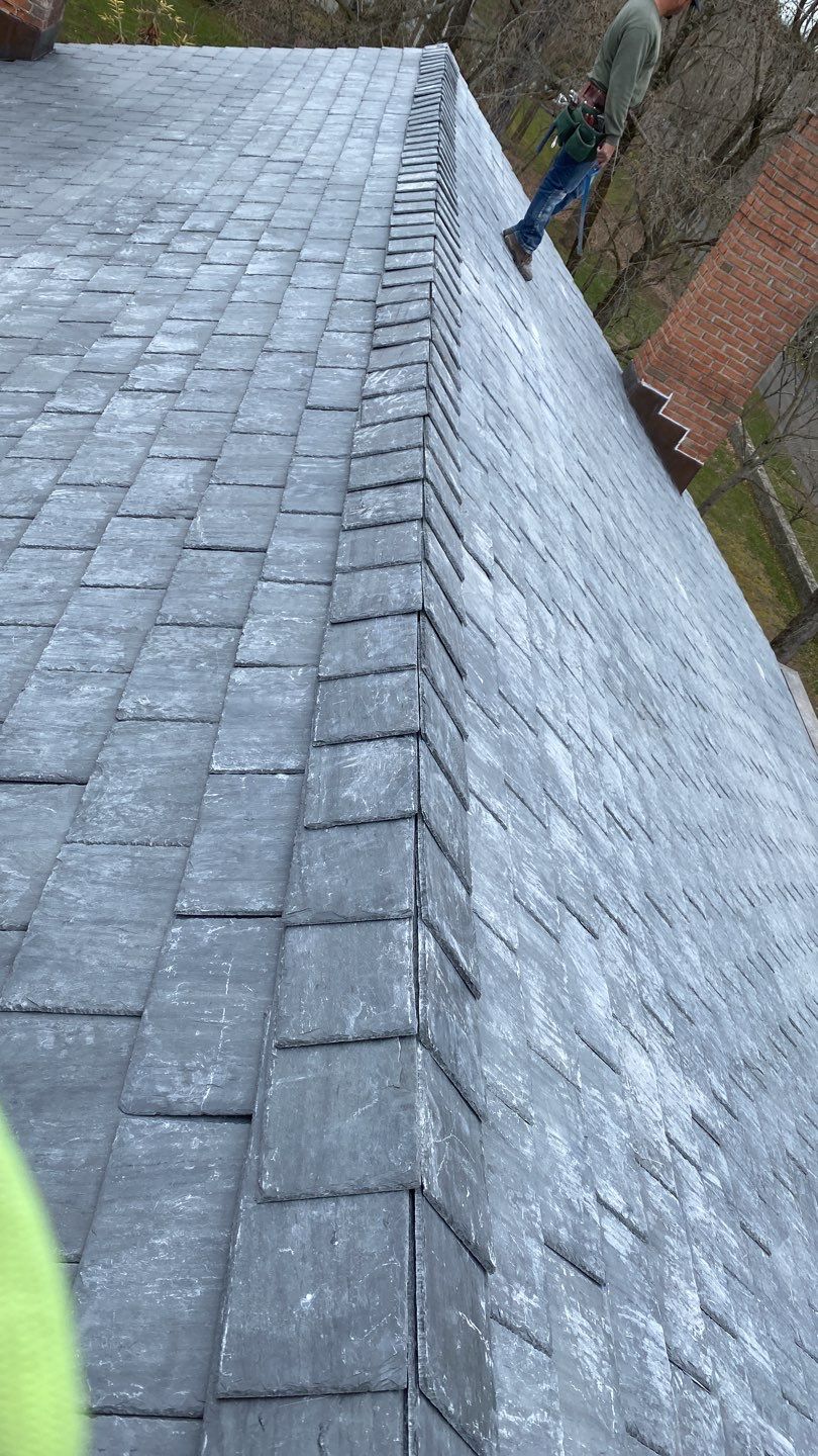 Residential Roofing Installation using Vermont Slate by A Plus Exterior