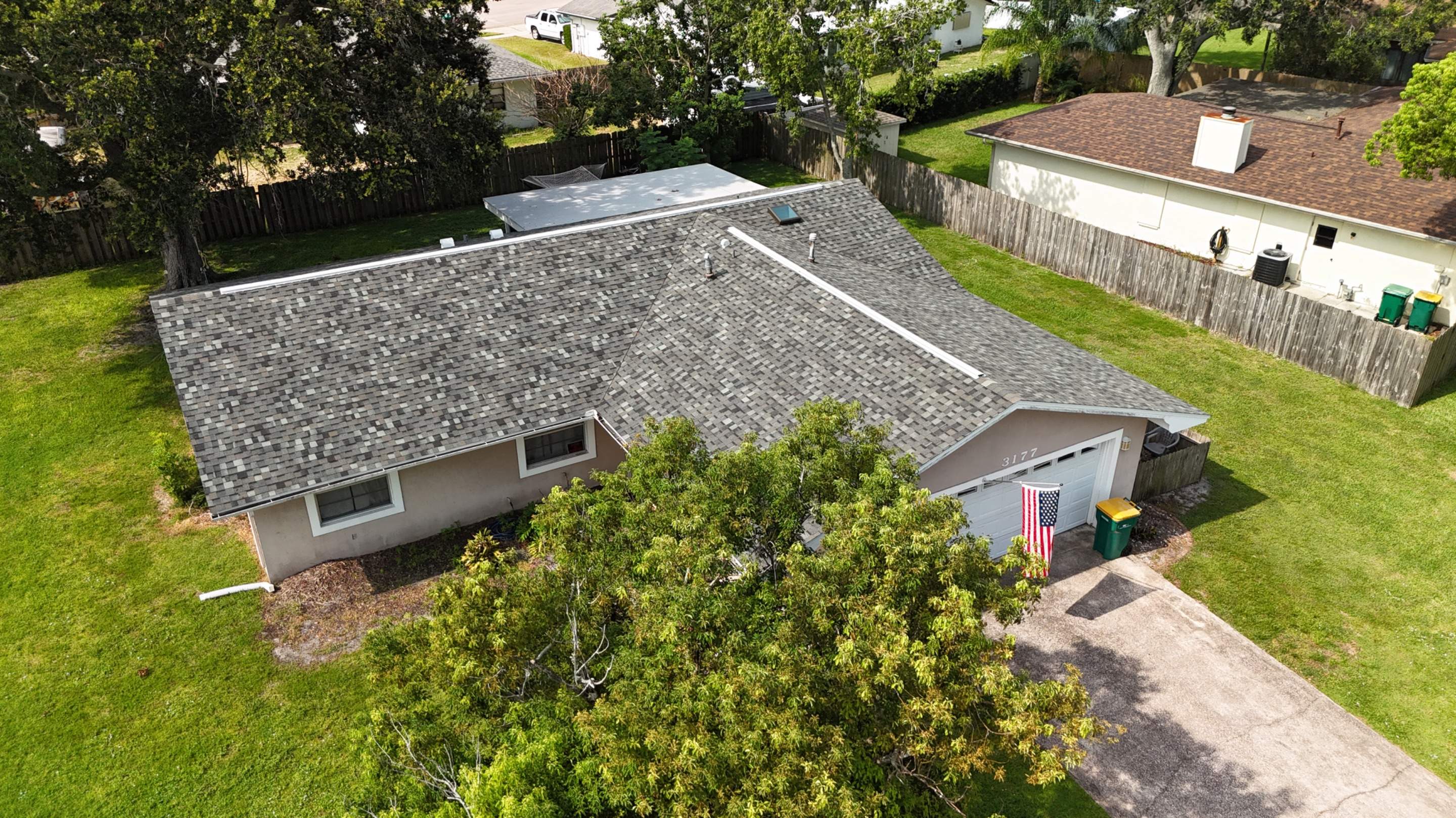 Melbourne Home Roof Replacement with Tamko Titan Thunderstorm Gray Shingles by Wiedmann Construction & Roofing