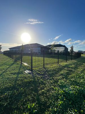 Aluminum Fence Installation using Black 3 Rail Aluminum Fence