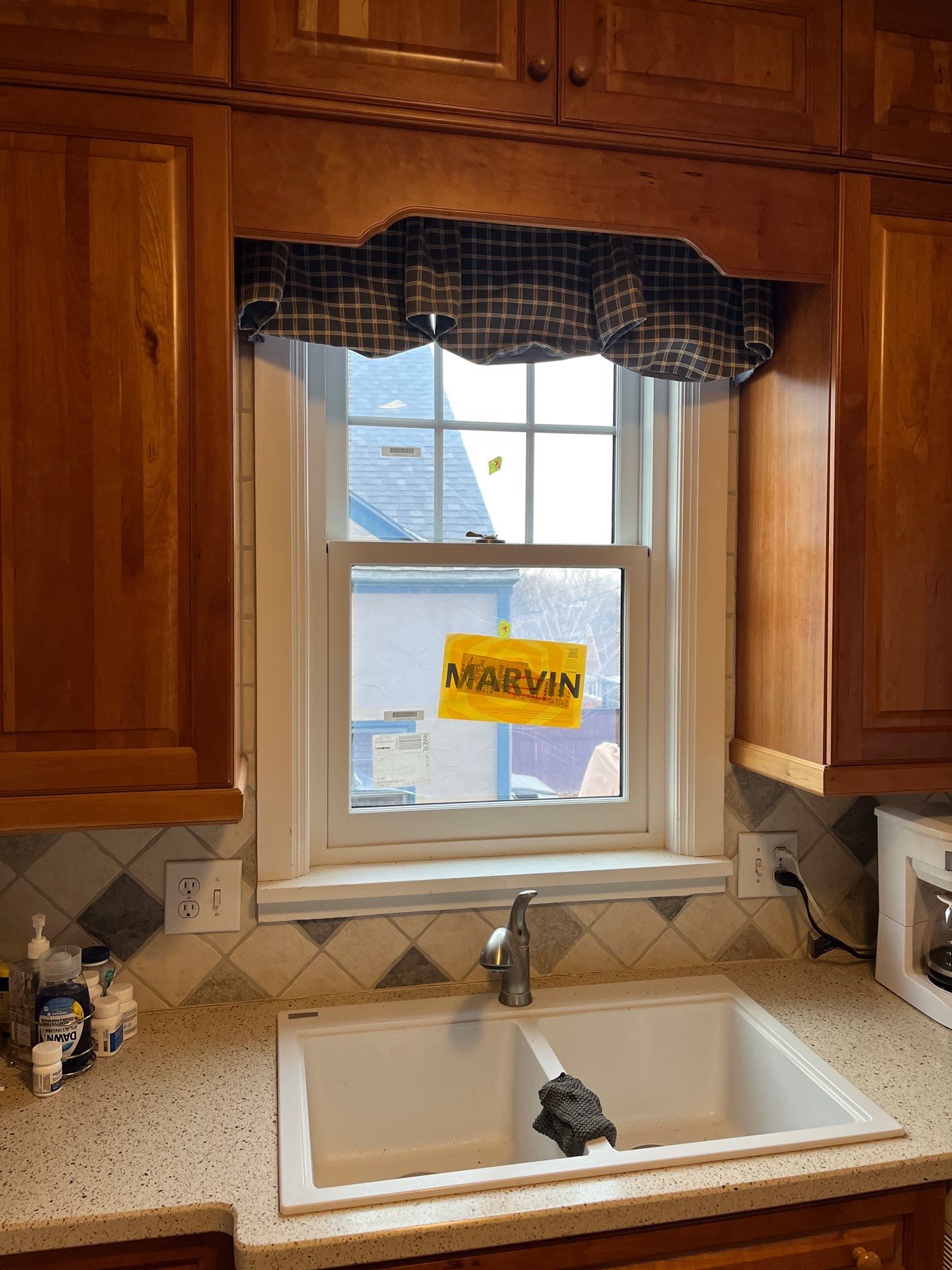 Dark Bronze Exterior Window Replacement Project in Omaha by Carps Complete Exteriors