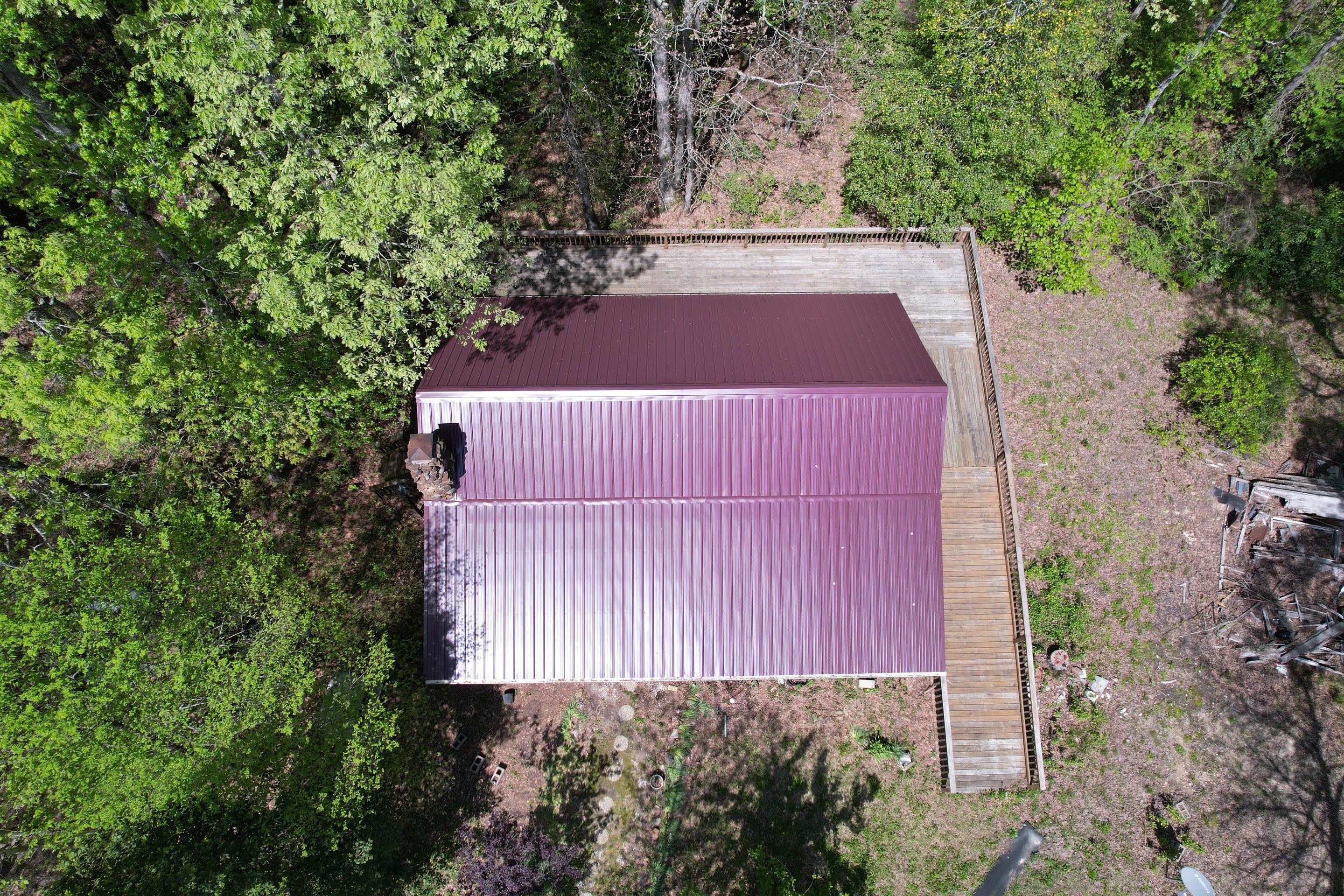 Residential Roofing Installation using Aluminum Roofing panels by Hostetler Roofing