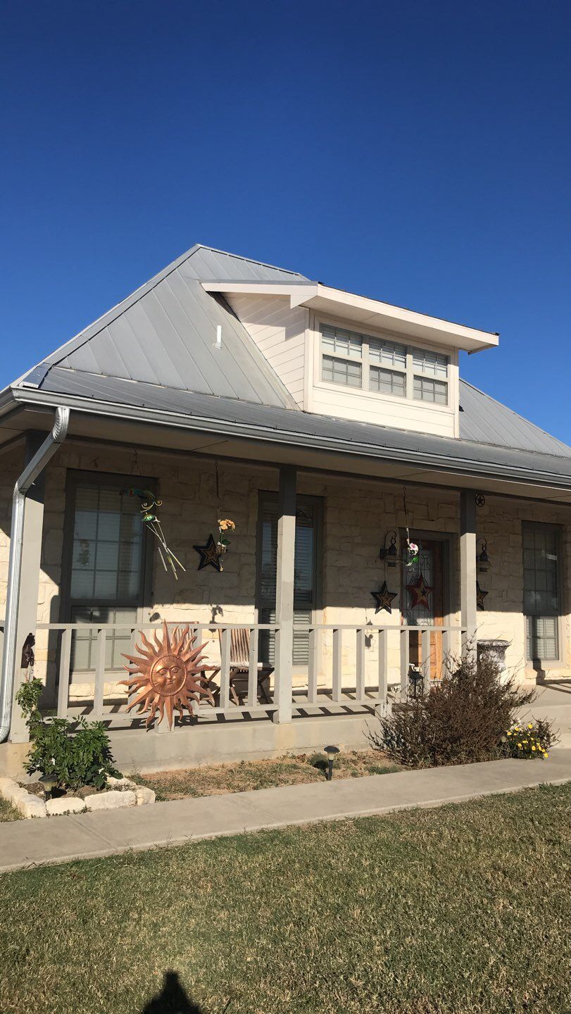 R-Panel Metal Roof Replacement by First Out Roofing 