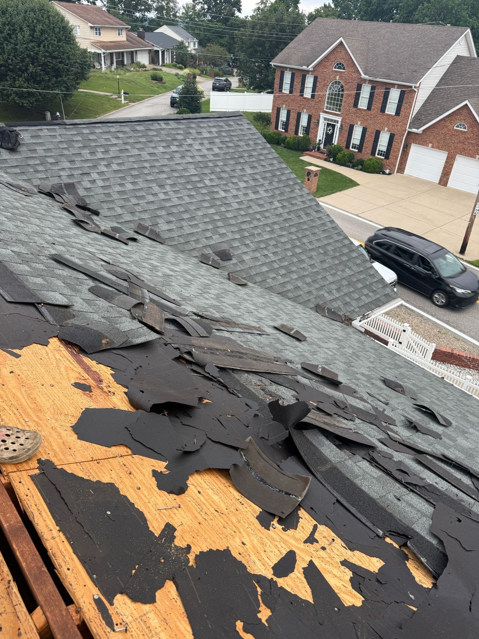 Residential Roofing Installation using GAF Timberline HDZ Charcoal by Rainstoppers Roofing