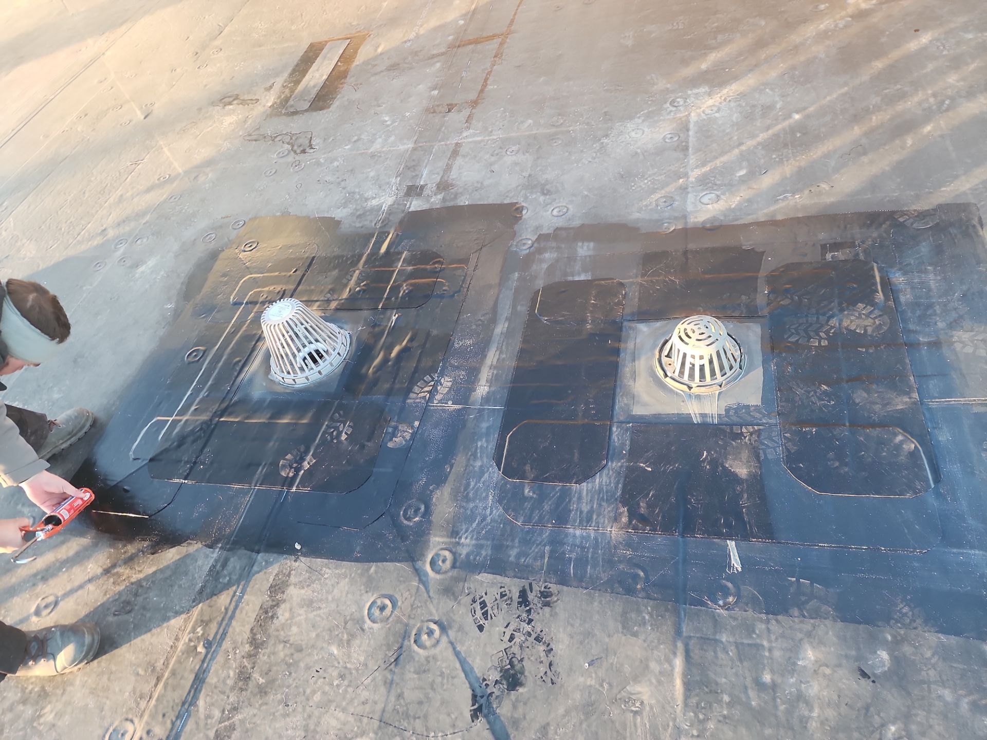 Commercial Roofing Installation using 60 mil rubber roof  by Nitro Roofing and Construction