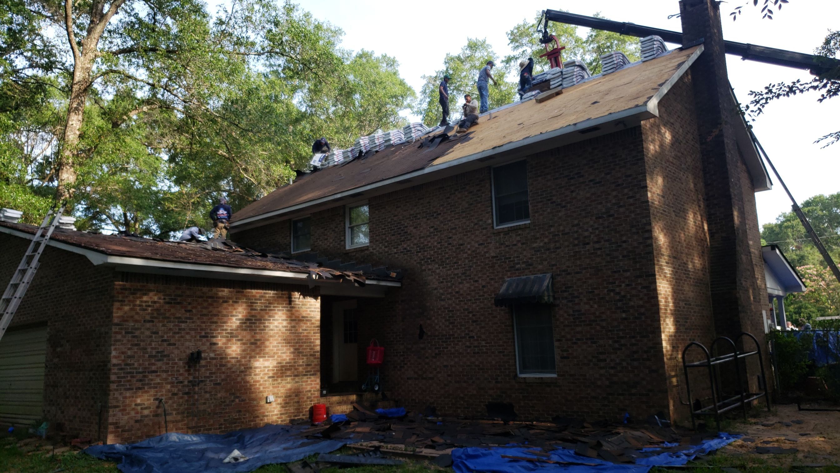 Residential Roofing Installation using Roof Replacement by American Roofing & Construction LLC