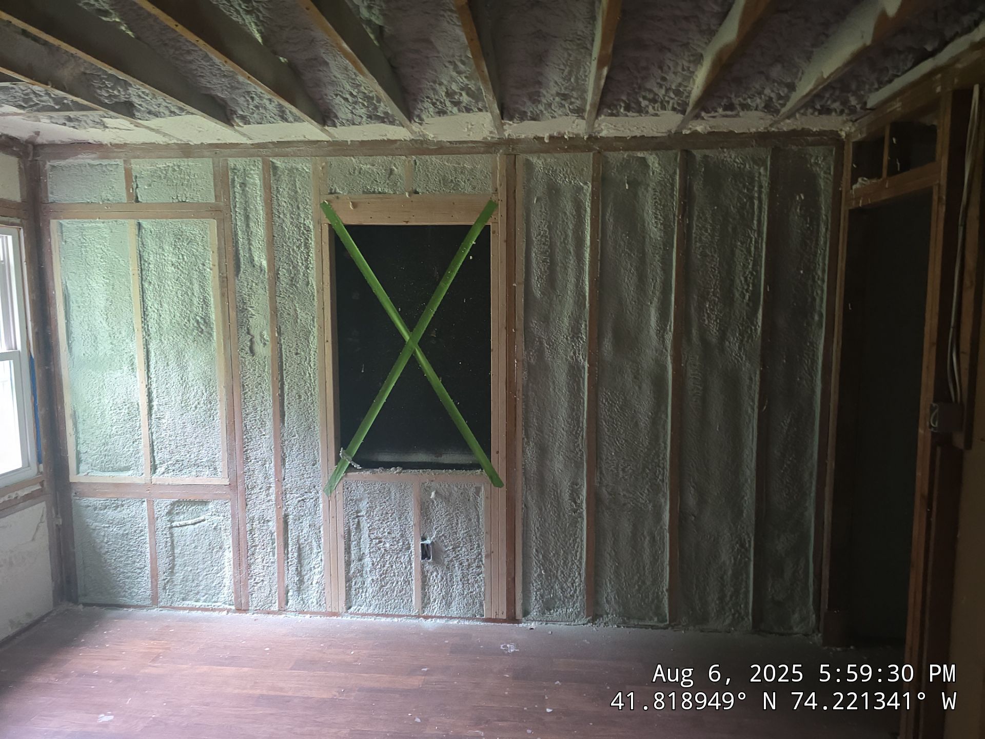 Master bedroom Exterior Walls using open cell spray foam by NYS Foam & Energy