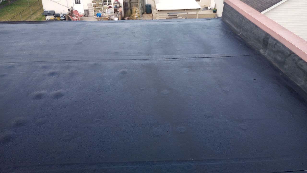 Commercial Roofing Installation using Performance Shingles by Mr. Roofer