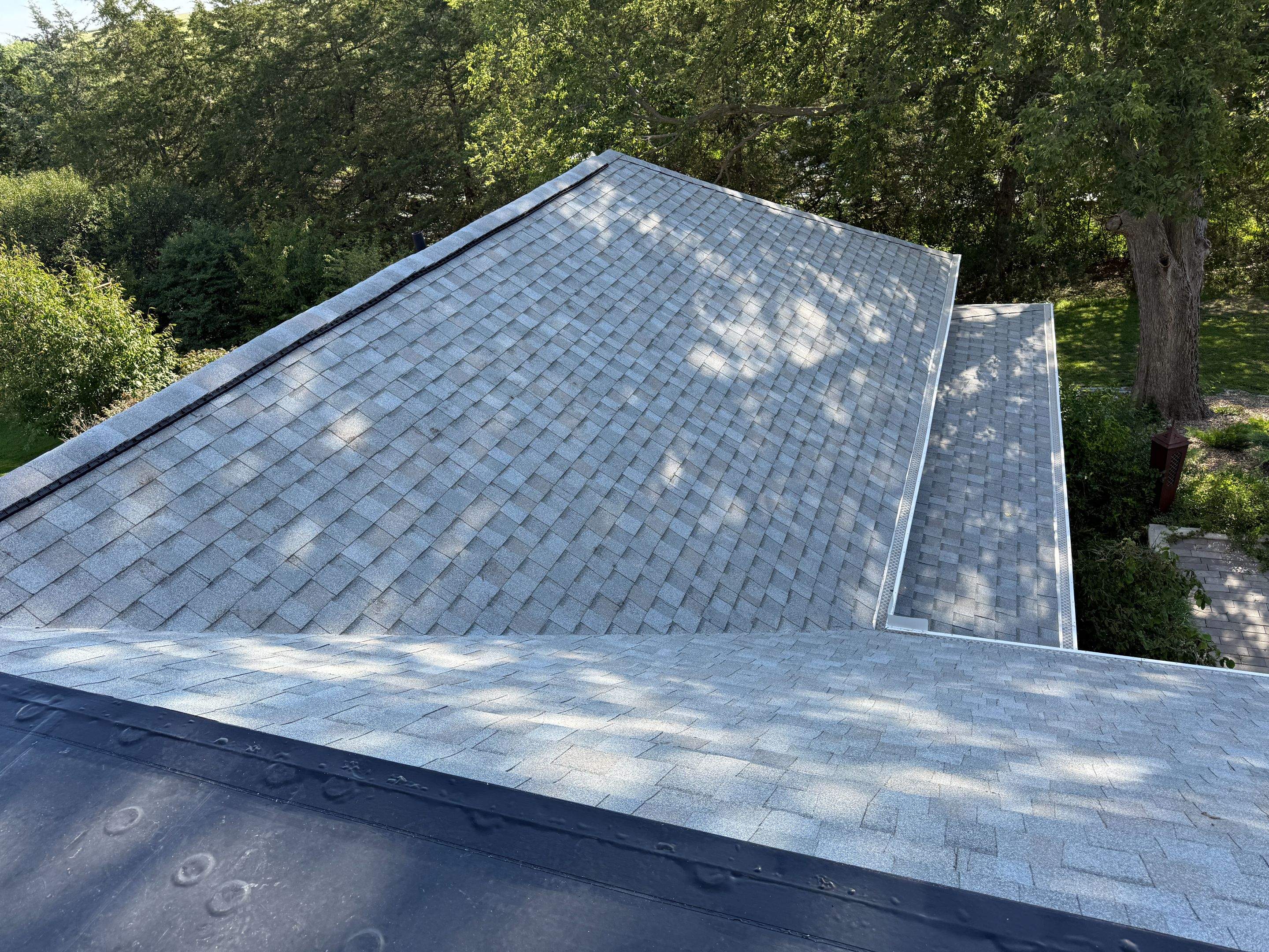 Asphalt Shingle and EPDM Membrane Roof Installation in Mineola by Star Home