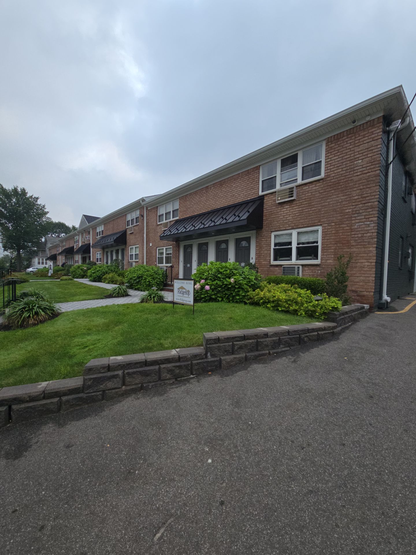 Multi-Unit Apartment Complex Exterior Brick Painting Project in Hackensack by Spectrum Painting, LLC