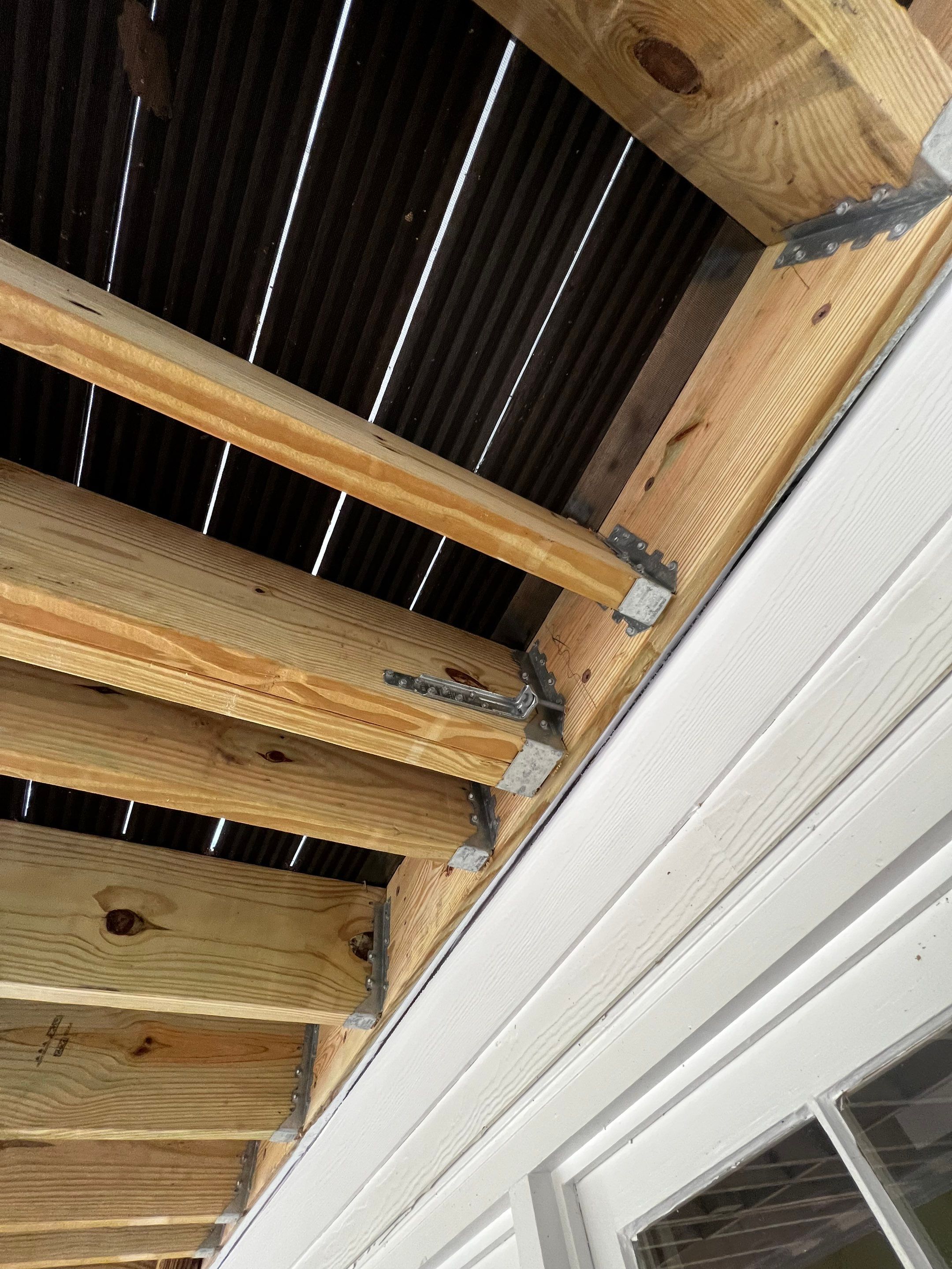 Elevated Composite Deck and Screened Porch Construction in Duluth by Swift Home Renovations 