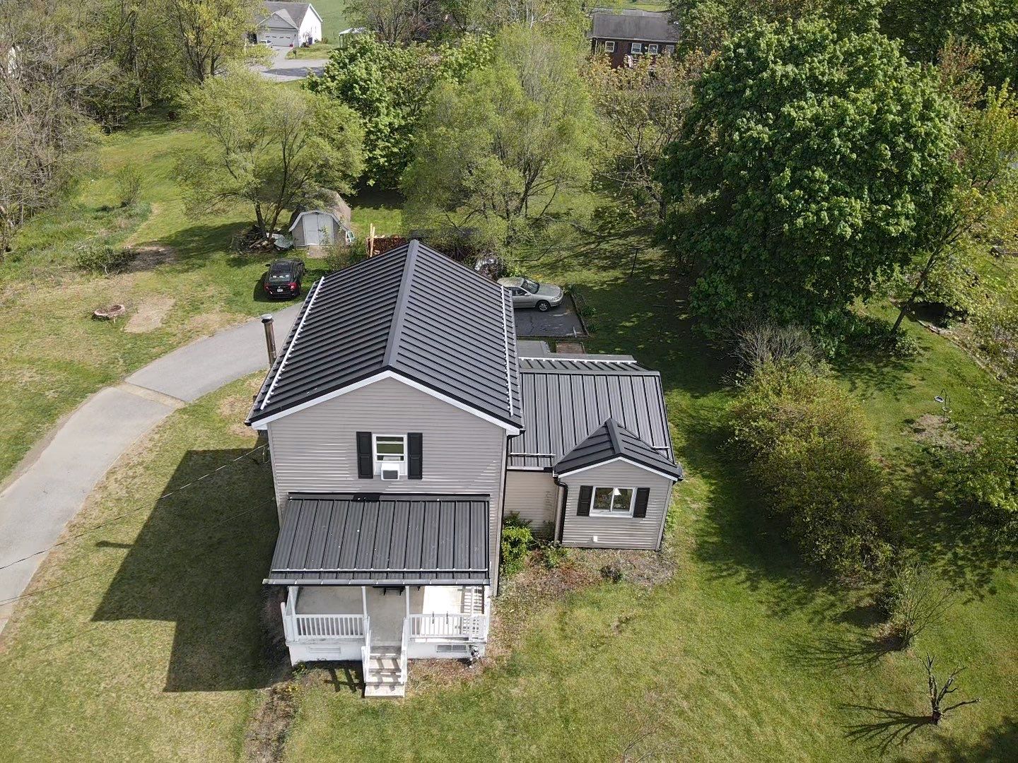 Residential Roofing Installation using Texture Standing Seam by Teflon Roofing