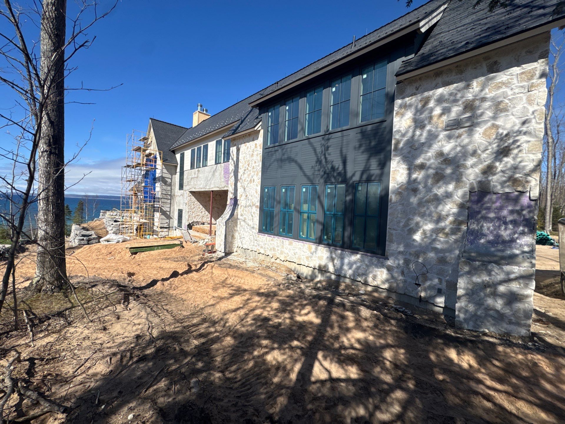 Half Round Gutter Installation for Petoskey Residence by Rainbow Seamless Systems