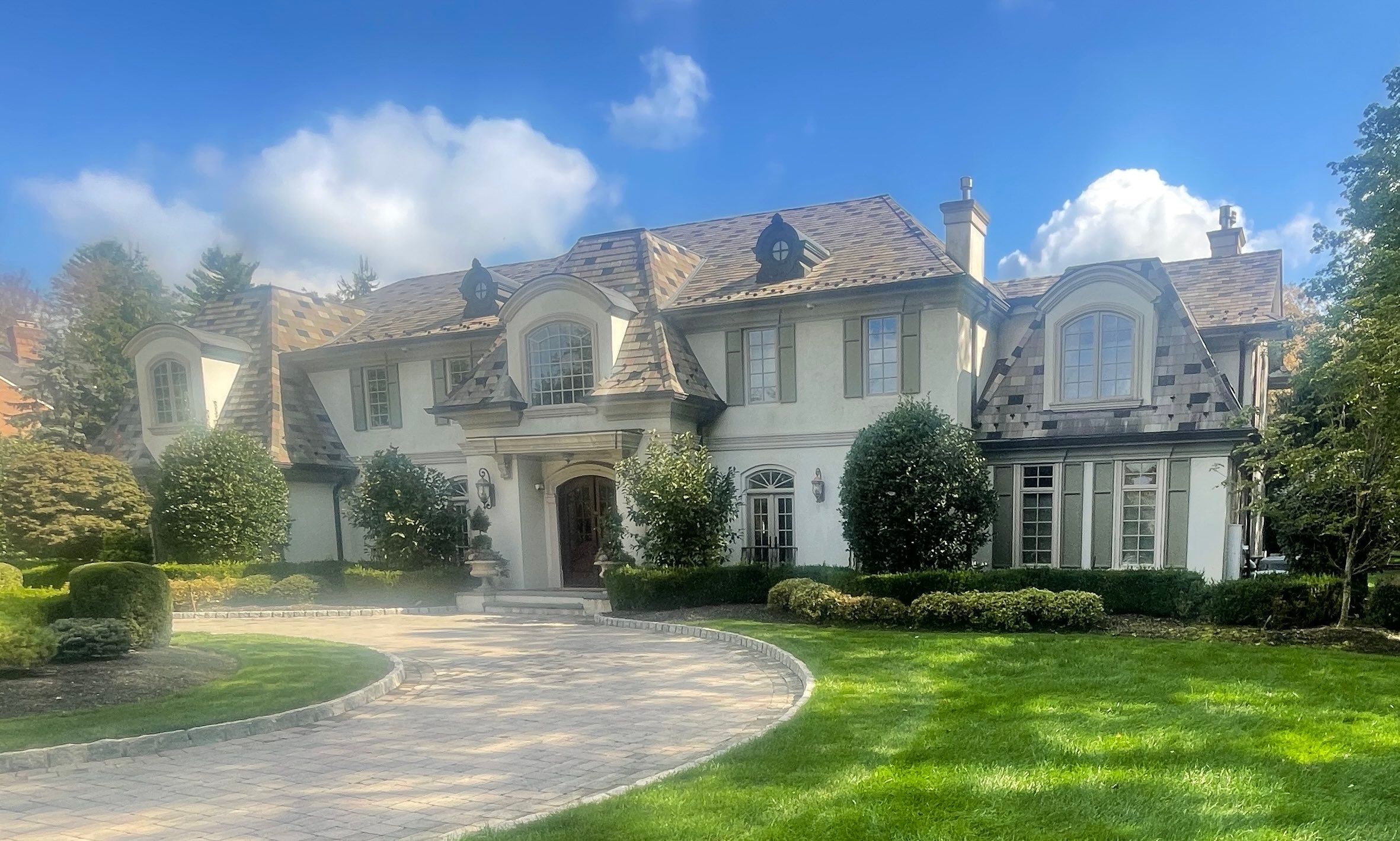 Full Slate - Stucco - Copper Remodel by USA Roof Masters