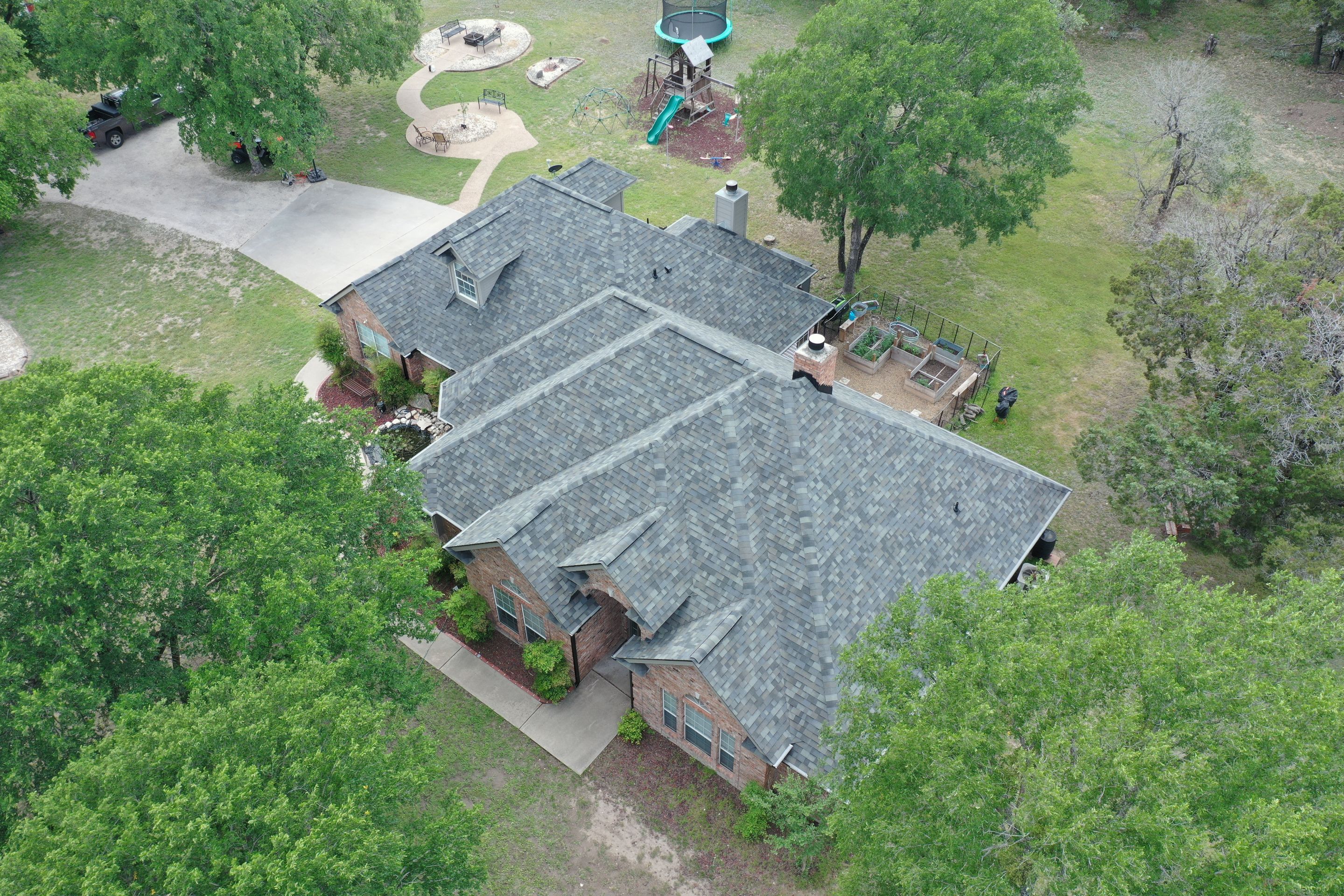 Residential Roof Replacement using Malarkey Vista AR - Storm Grey by Action Exteriors Austin
