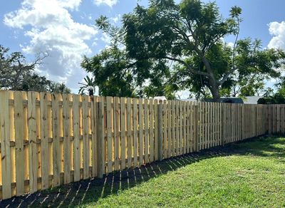 Wood Fence Installation using Wood Pressure Treated Fence 