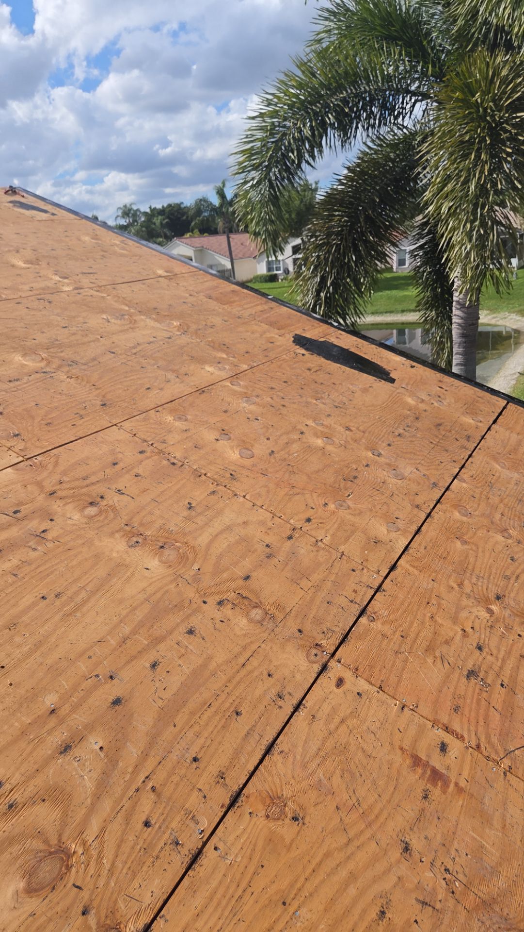 Residential Concrete Tile Roof Replacement and Fascia Repair in Boca Raton by Aastro Roofing