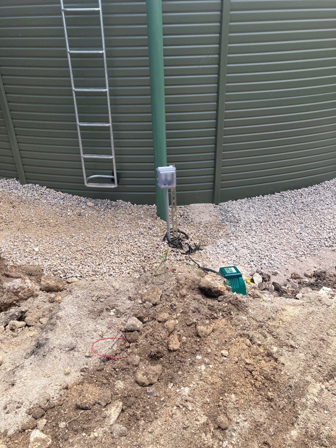 Residential Rainwater Collection System - Pioneer 40K gallon water tank in Mangrove Green by Hill Country Rain Water