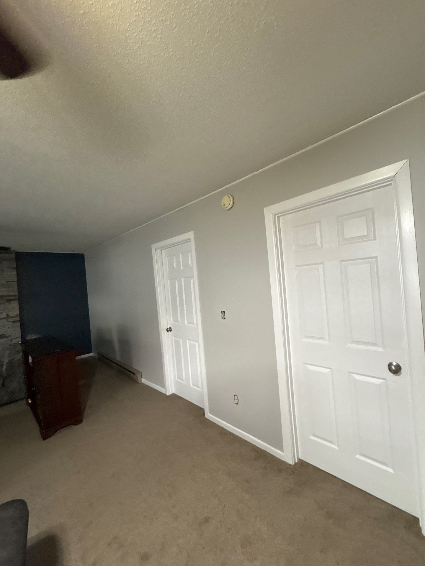 Multi-Room Interior Painting and Drywall Repair in Sioux Falls by Select Painting, Coatings & Garage Cabinets