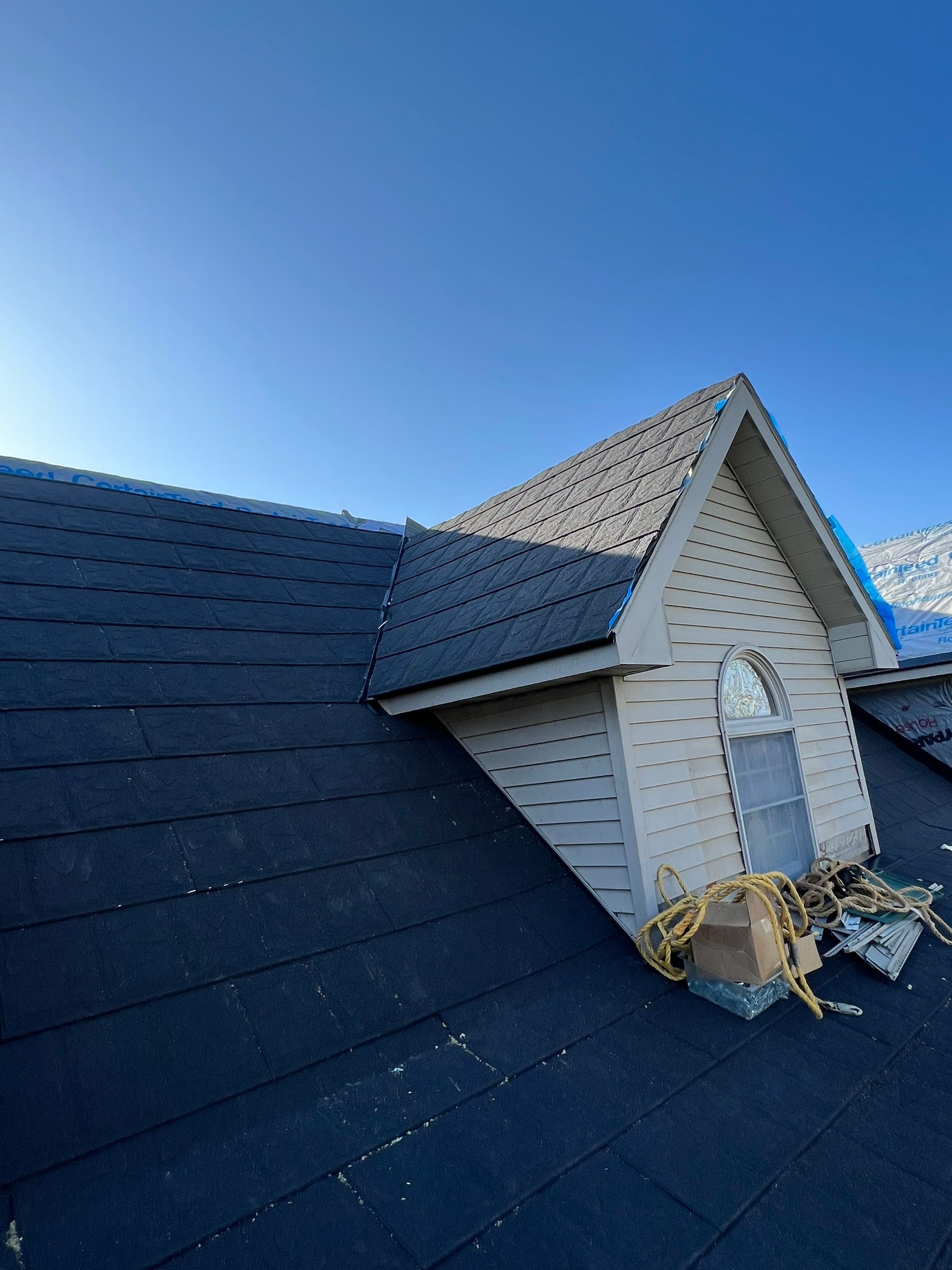 Residential Roofing Repair using Metstar Stone Coated Charcoal by Nitro Roofing and Construction