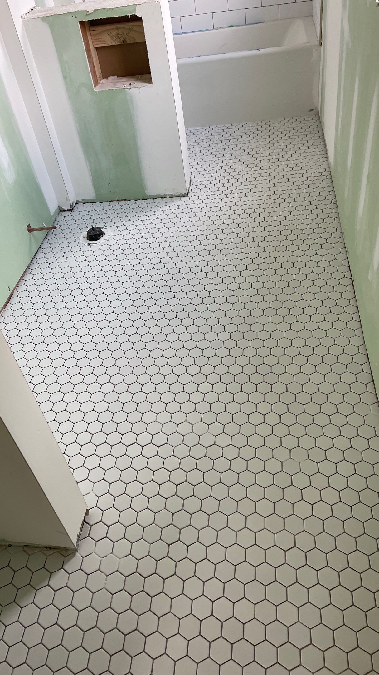 Remodeled Home with new tile floors, Showers and Refinished Oak Floors with stain and Waterbased Finish by Footprints Floors of Coastal Carolina